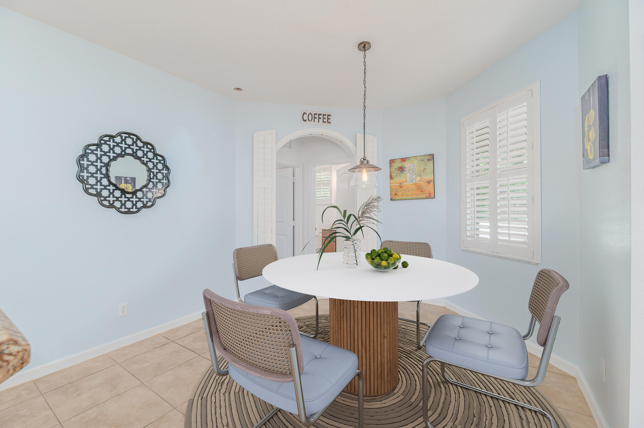 2187 Northwest Dalea Way Stuart, FL 34994 - Photo 11 of 41 a view of a dining room with furniture and wooden floor