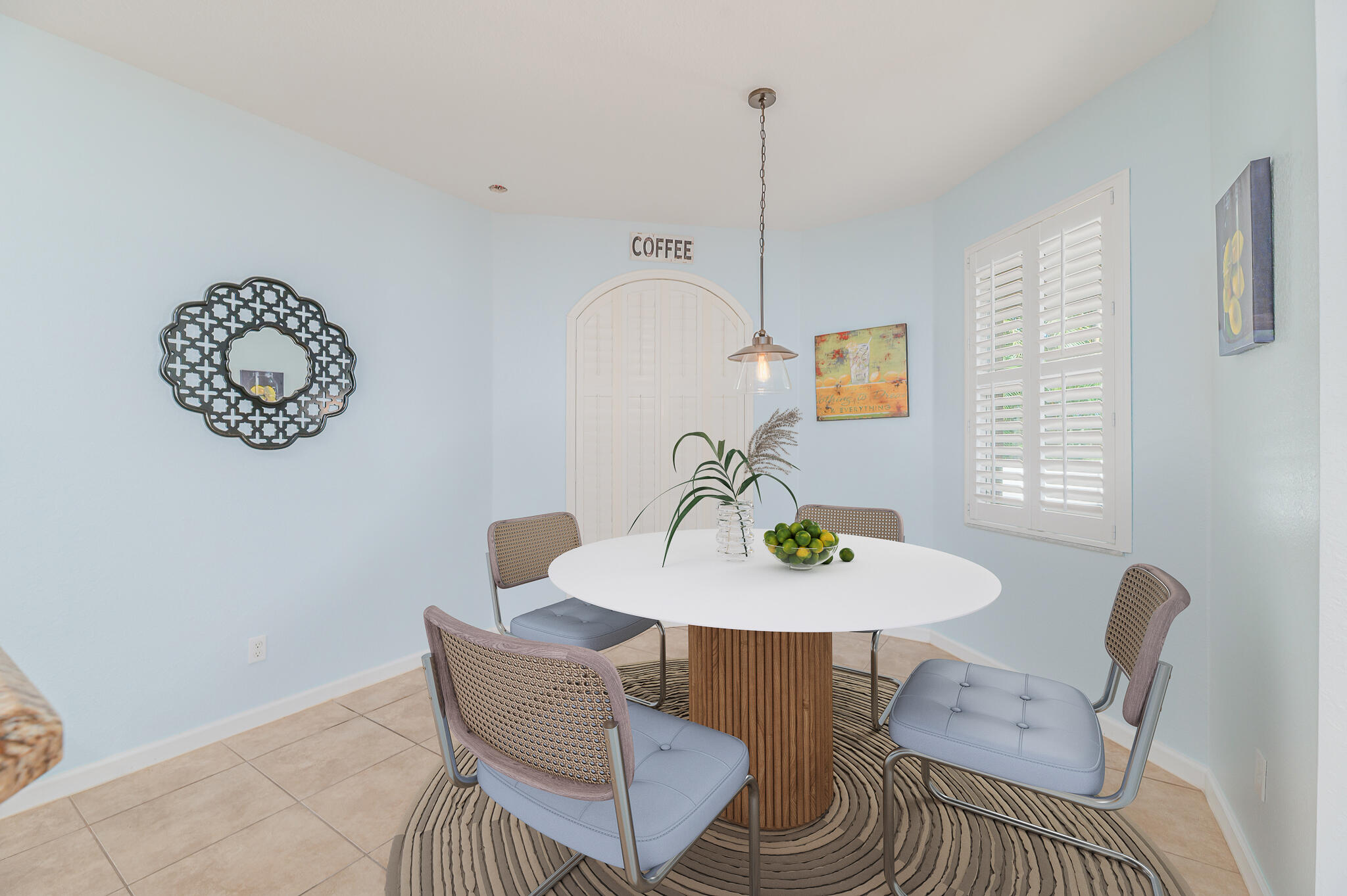 2187 Northwest Dalea Way Stuart, FL 34994 - Photo 13 of 41 a view of a dining room with furniture and wooden floor