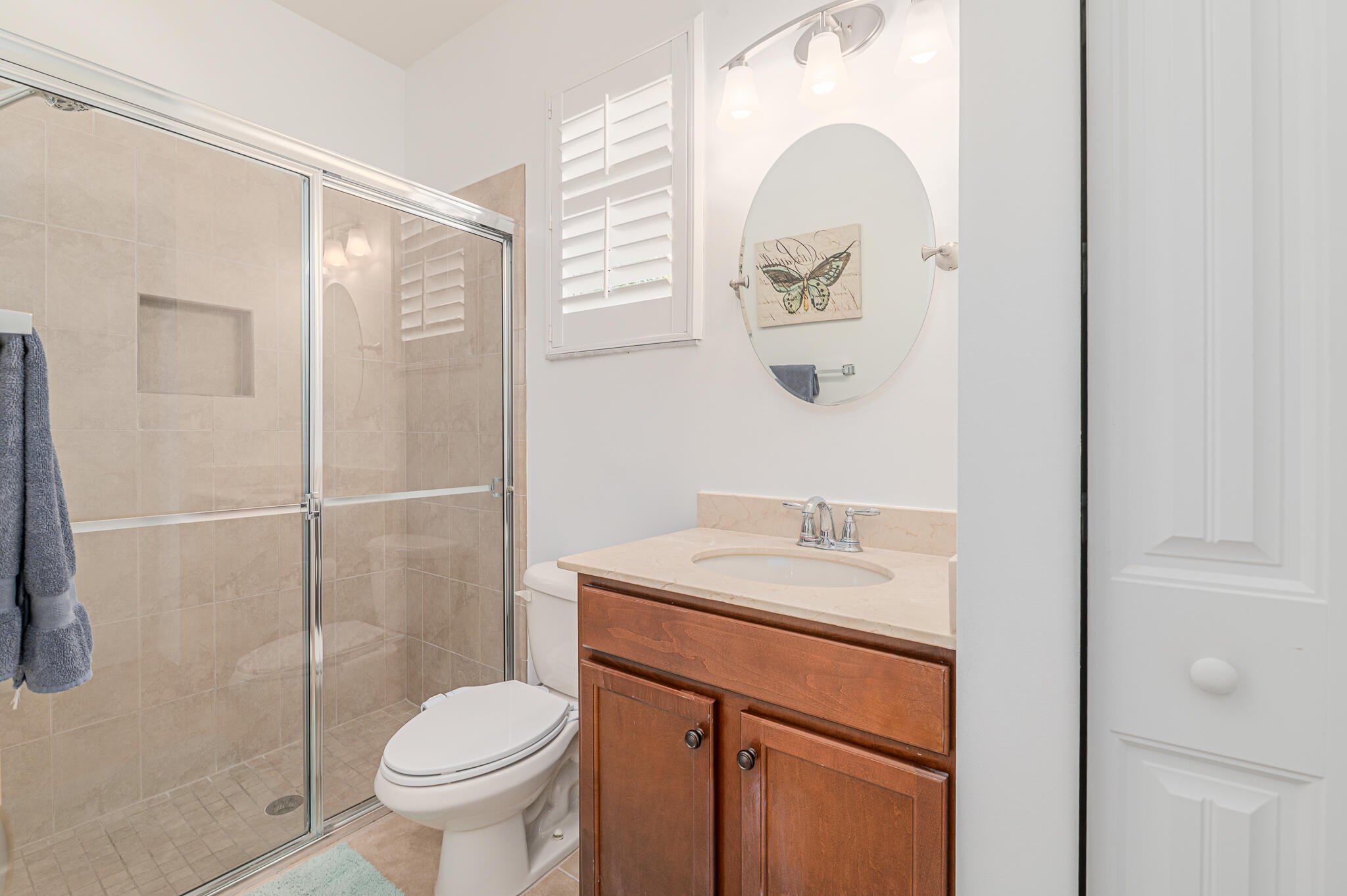 2187 Northwest Dalea Way Stuart, FL 34994 - Photo 15 of 41 a bathroom with a sink toilet and a mirror