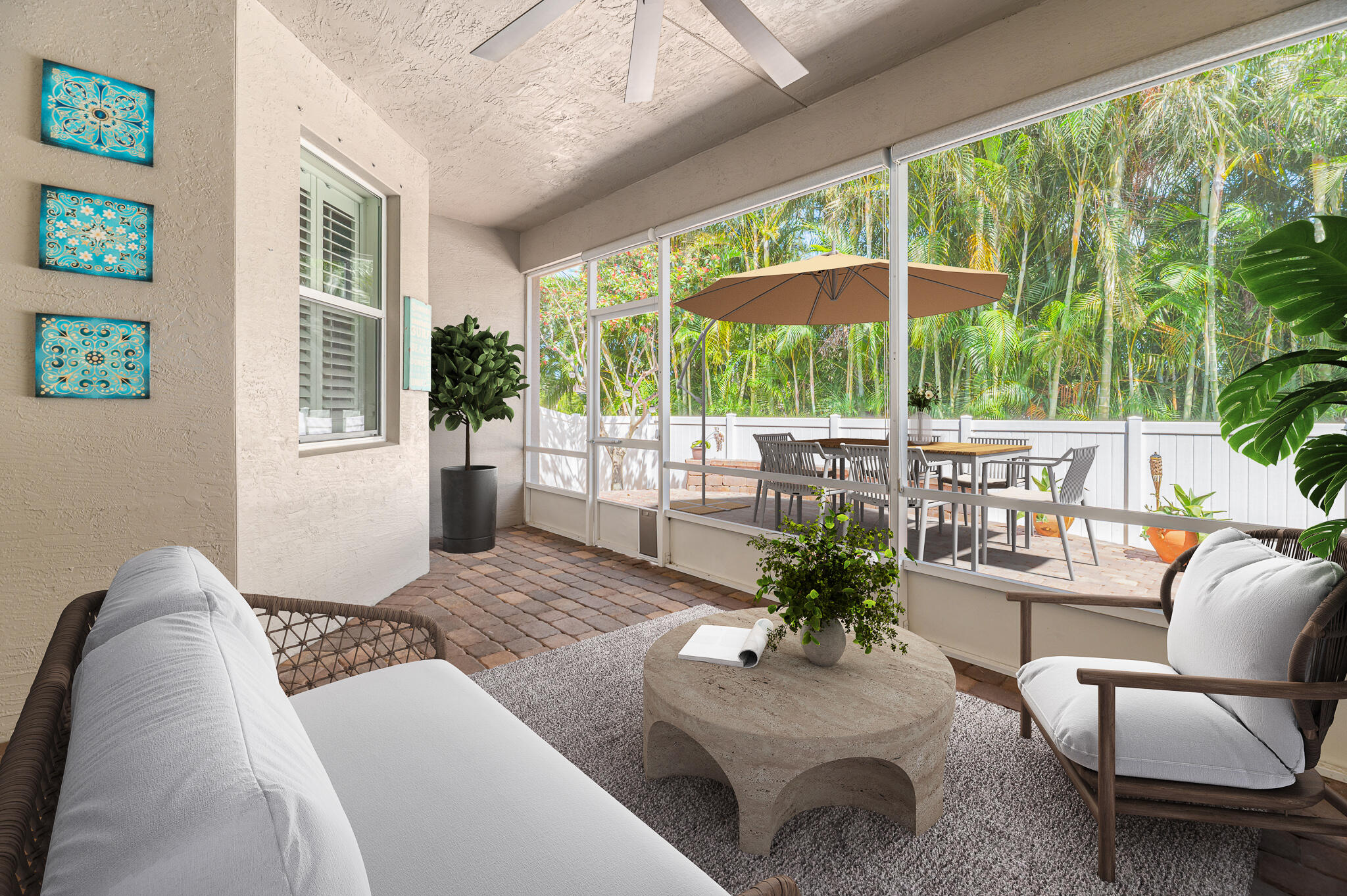 2187 Northwest Dalea Way Stuart, FL 34994 - Photo 27 of 41 a living room with furniture and a potted plant