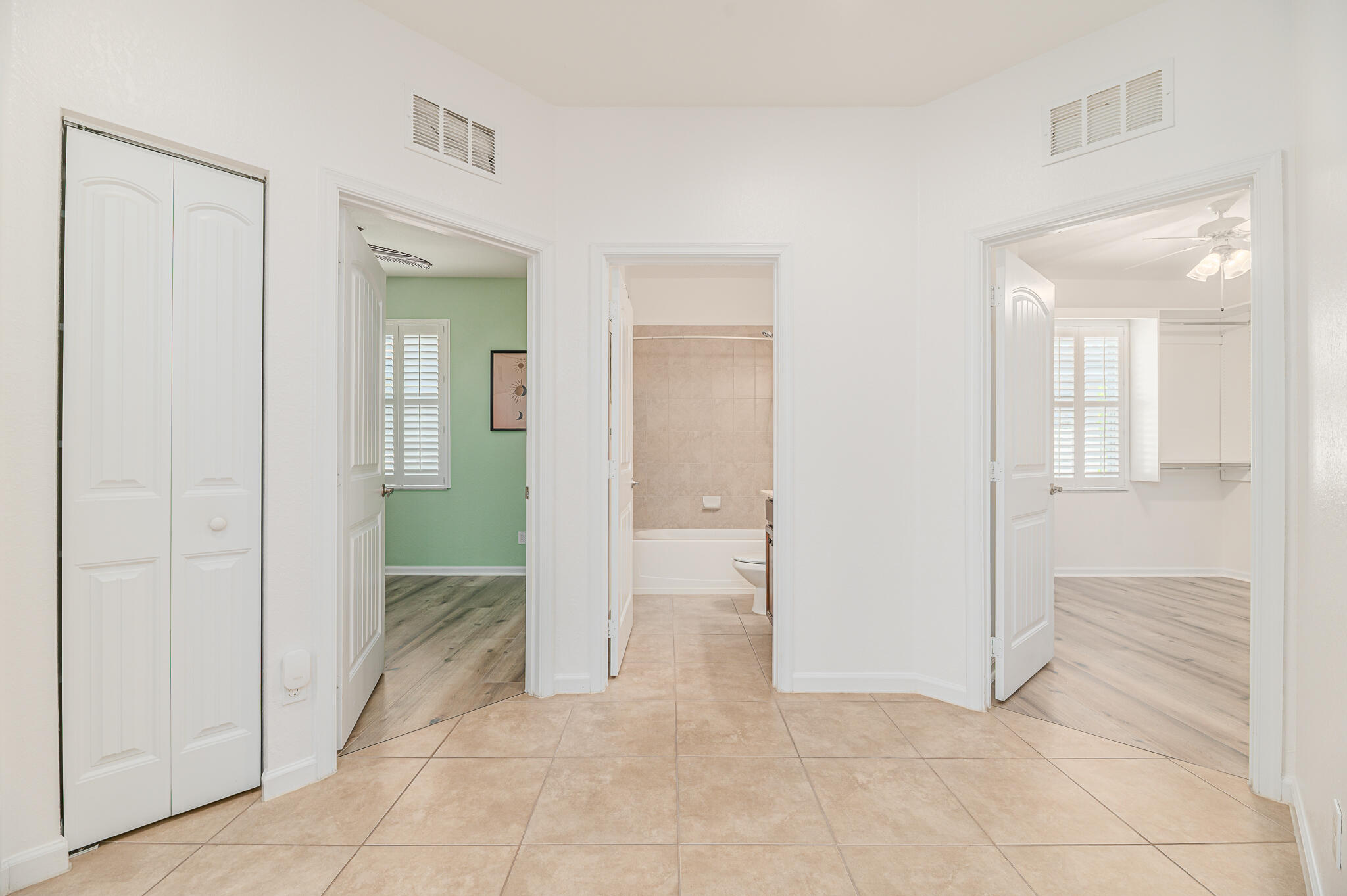 2187 Northwest Dalea Way Stuart, FL 34994 - Photo 30 of 41 wooden floor with a en suite bathroom