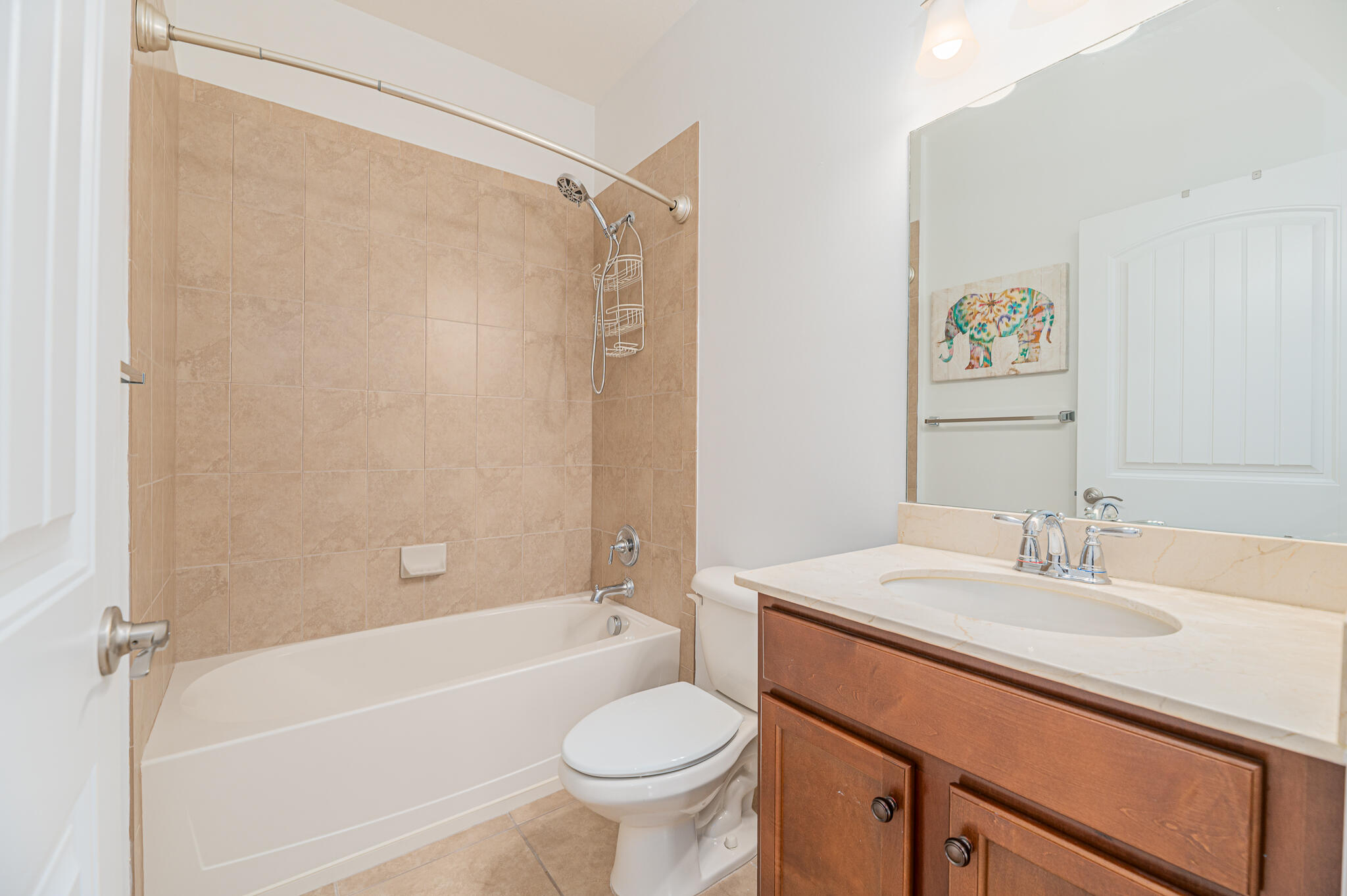 2187 Northwest Dalea Way Stuart, FL 34994 - Photo 32 of 41 a bathroom with a sink a toilet and a bathtub