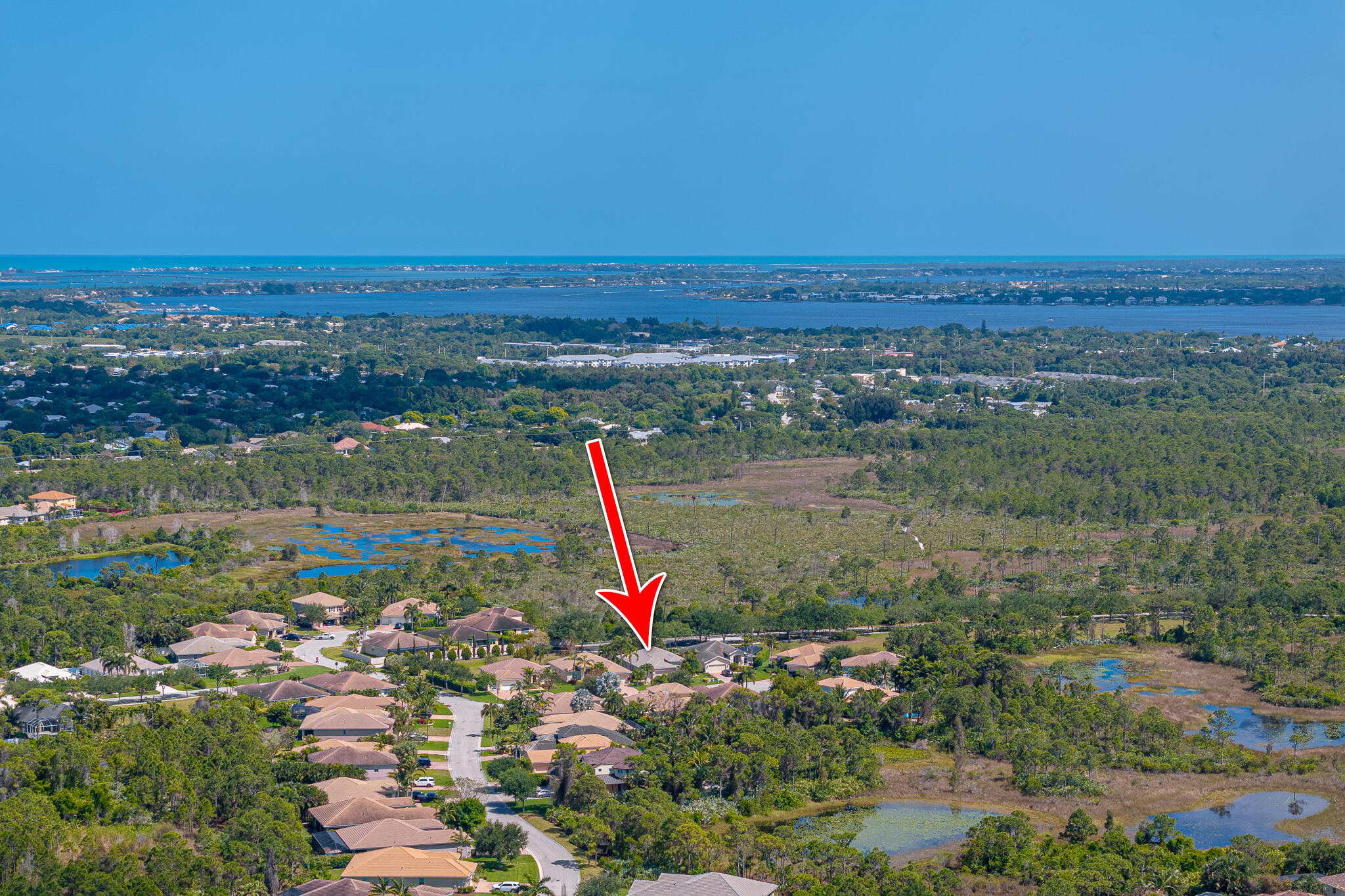 2187 Northwest Dalea Way Stuart, FL 34994 - Photo 36 of 41 a view of a lake with a city