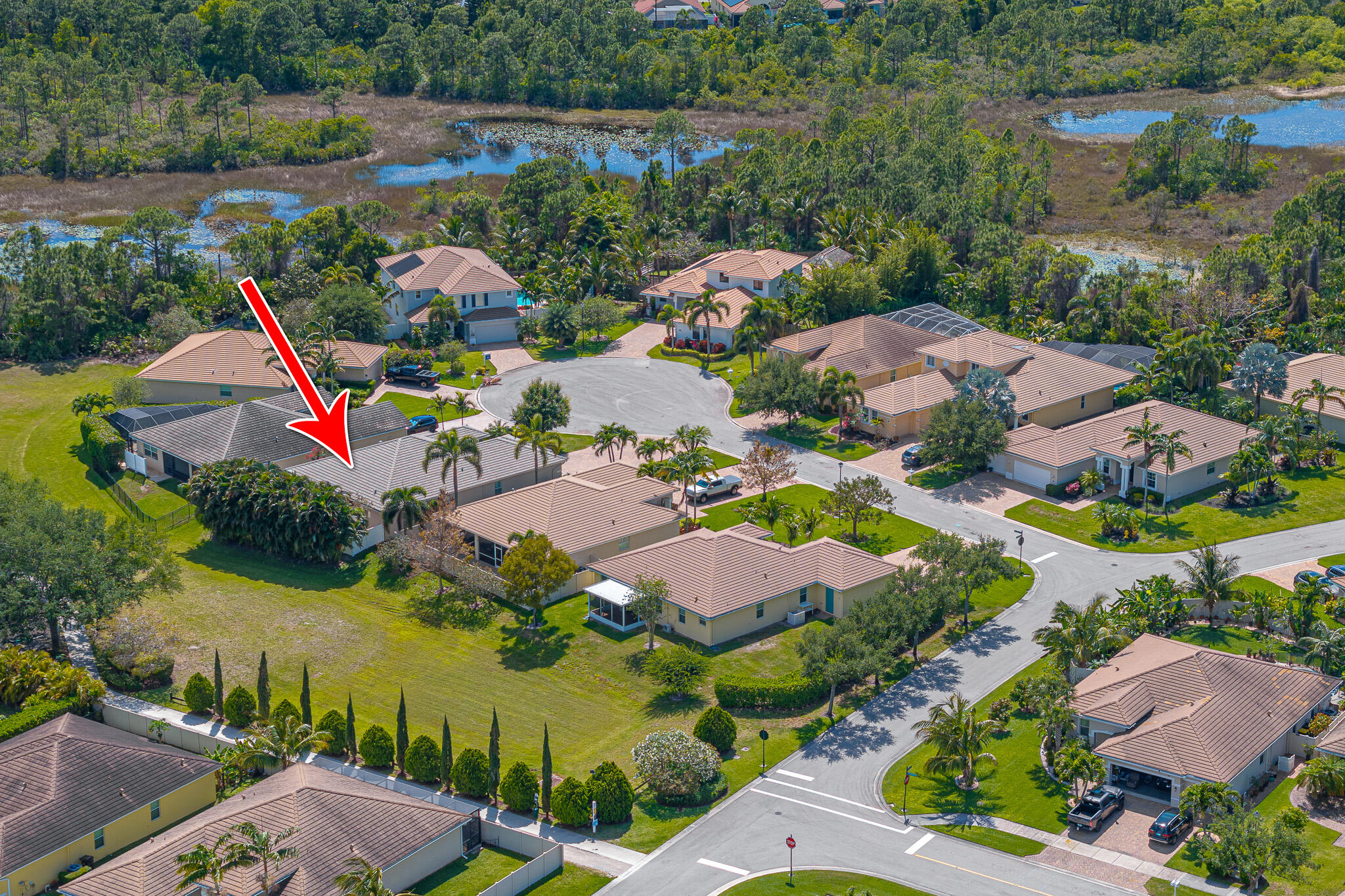 2187 Northwest Dalea Way Stuart, FL 34994 - Photo 37 of 41 an aerial view of house swimming pool and outdoor space