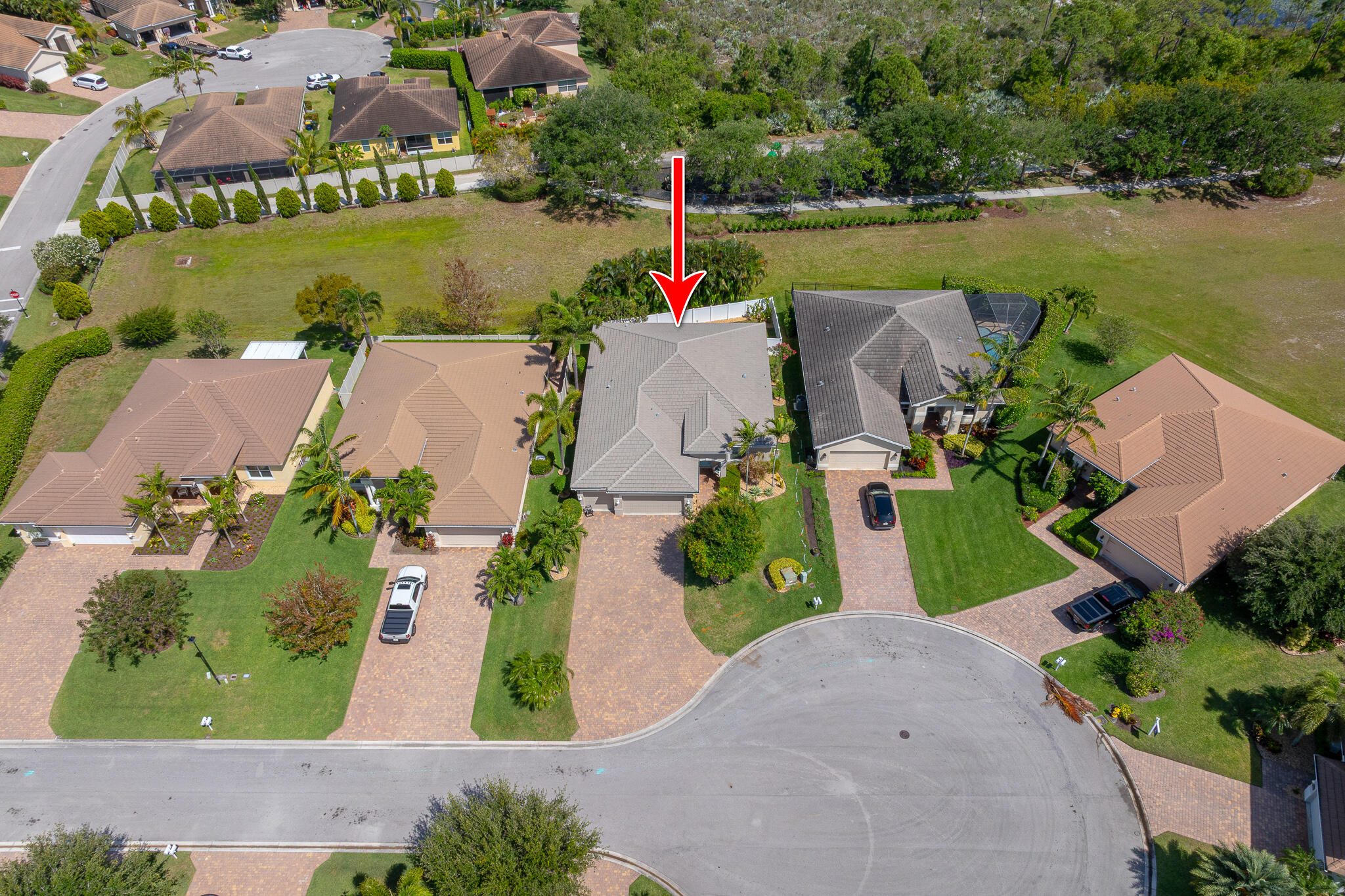 2187 Northwest Dalea Way Stuart, FL 34994 - Photo 40 of 41 an aerial view of a house with outdoor space and lake view