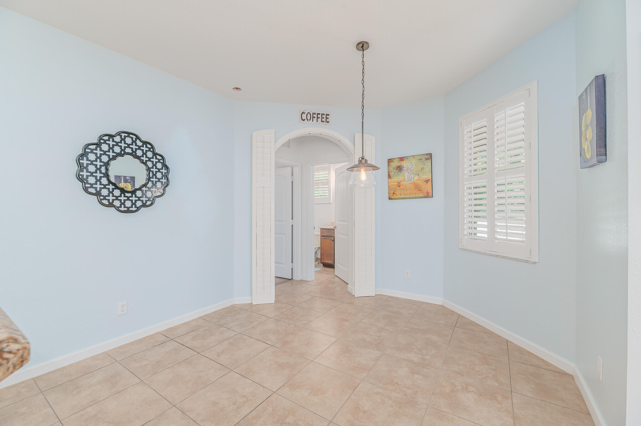 2187 Northwest Dalea Way Stuart, FL 34994 - Photo 10 of 41 a view of an empty room with a window