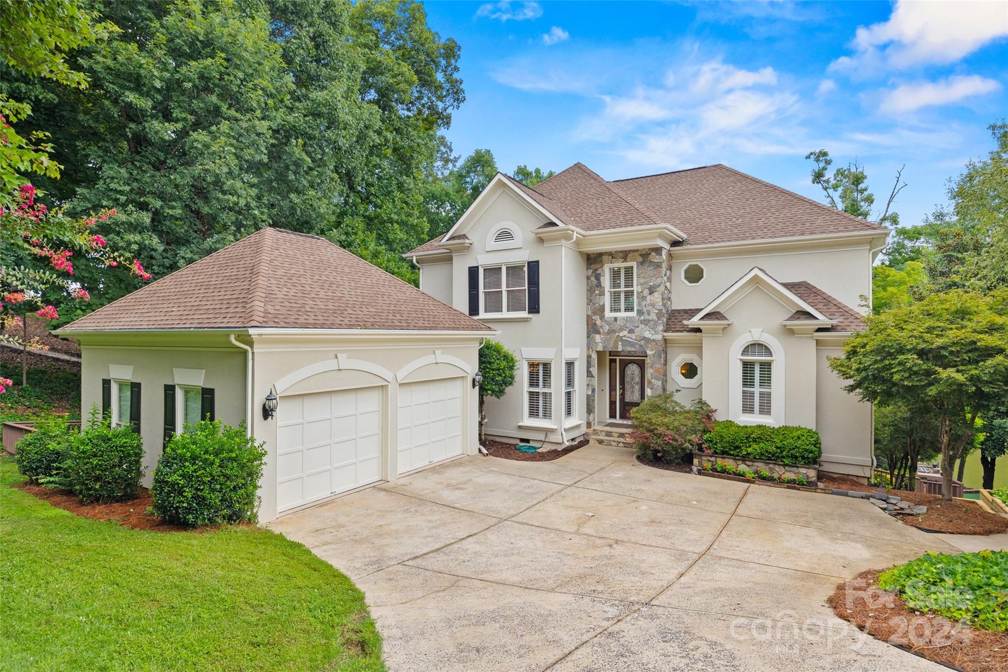 16201 Crest Cove Road Charlotte, NC 28278 - Photo 1 of 48 a front view of a house with garden