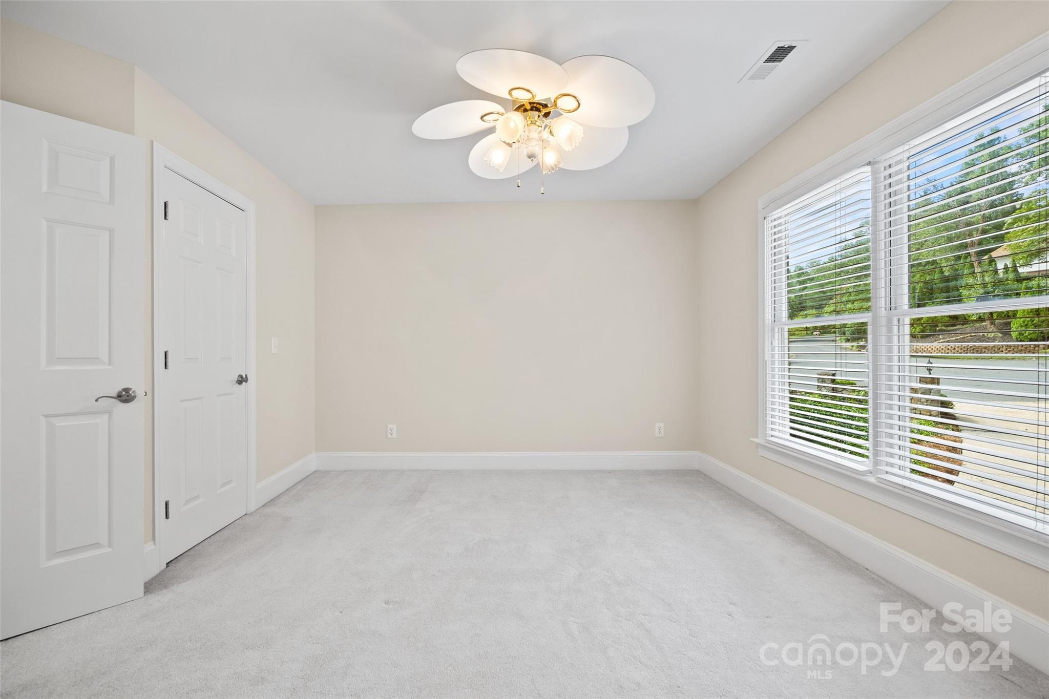 16201 Crest Cove Road Charlotte, NC 28278 - Photo 25 of 48 a view of an empty room with a window