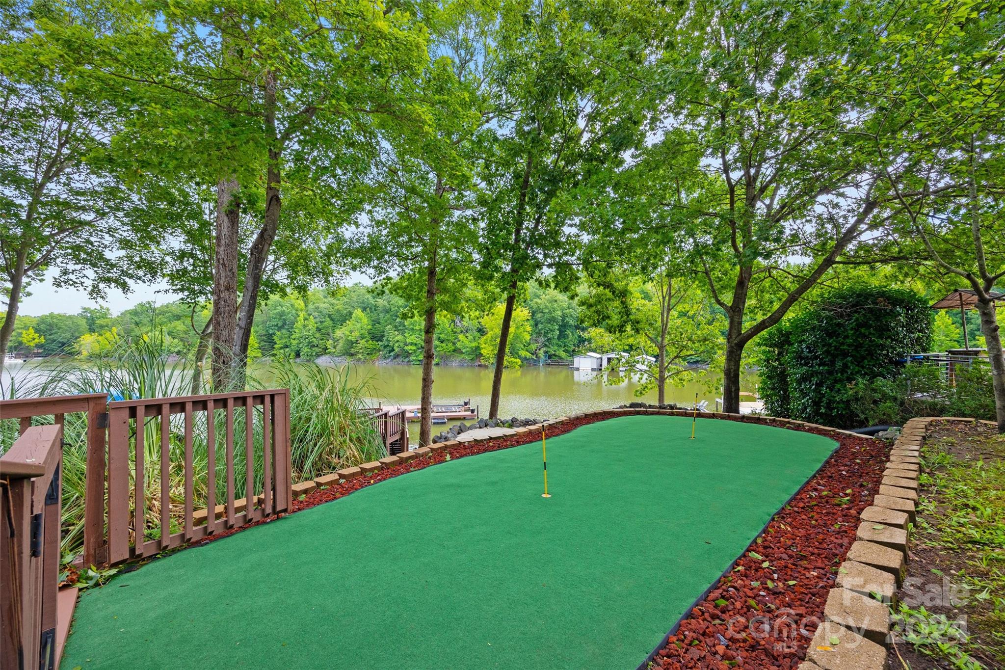 16201 Crest Cove Road Charlotte, NC 28278 - Photo 35 of 48 a view of a park with large trees