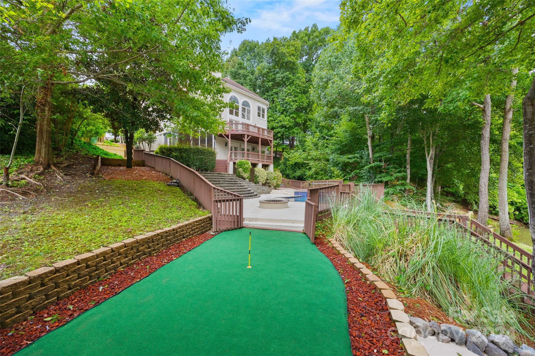 16201 Crest Cove Road Charlotte, NC 28278 - Photo 36 of 48 a view of a house with pool