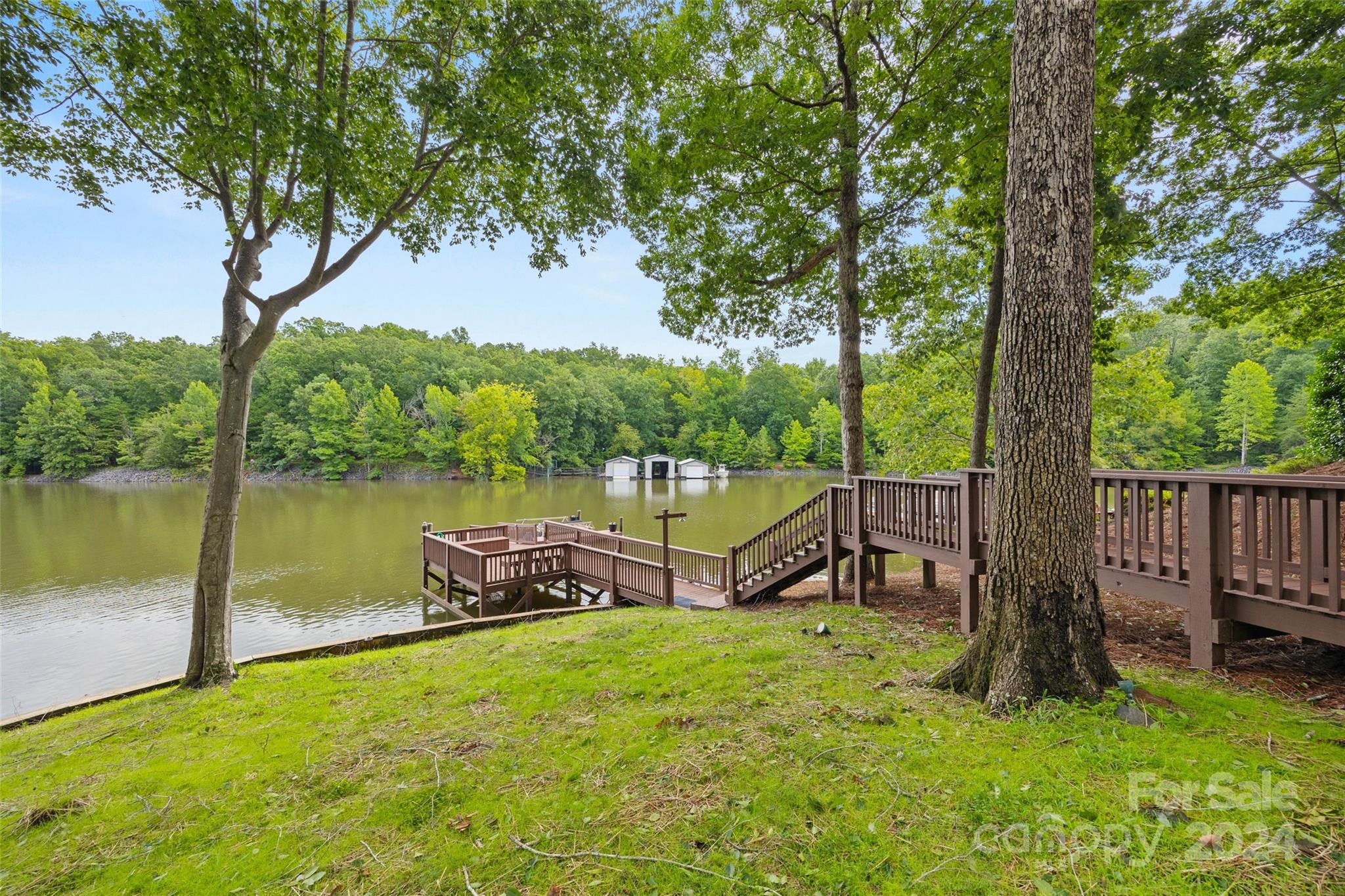 16201 Crest Cove Road Charlotte, NC 28278 - Photo 37 of 48 a view of a wooden deck and a yard