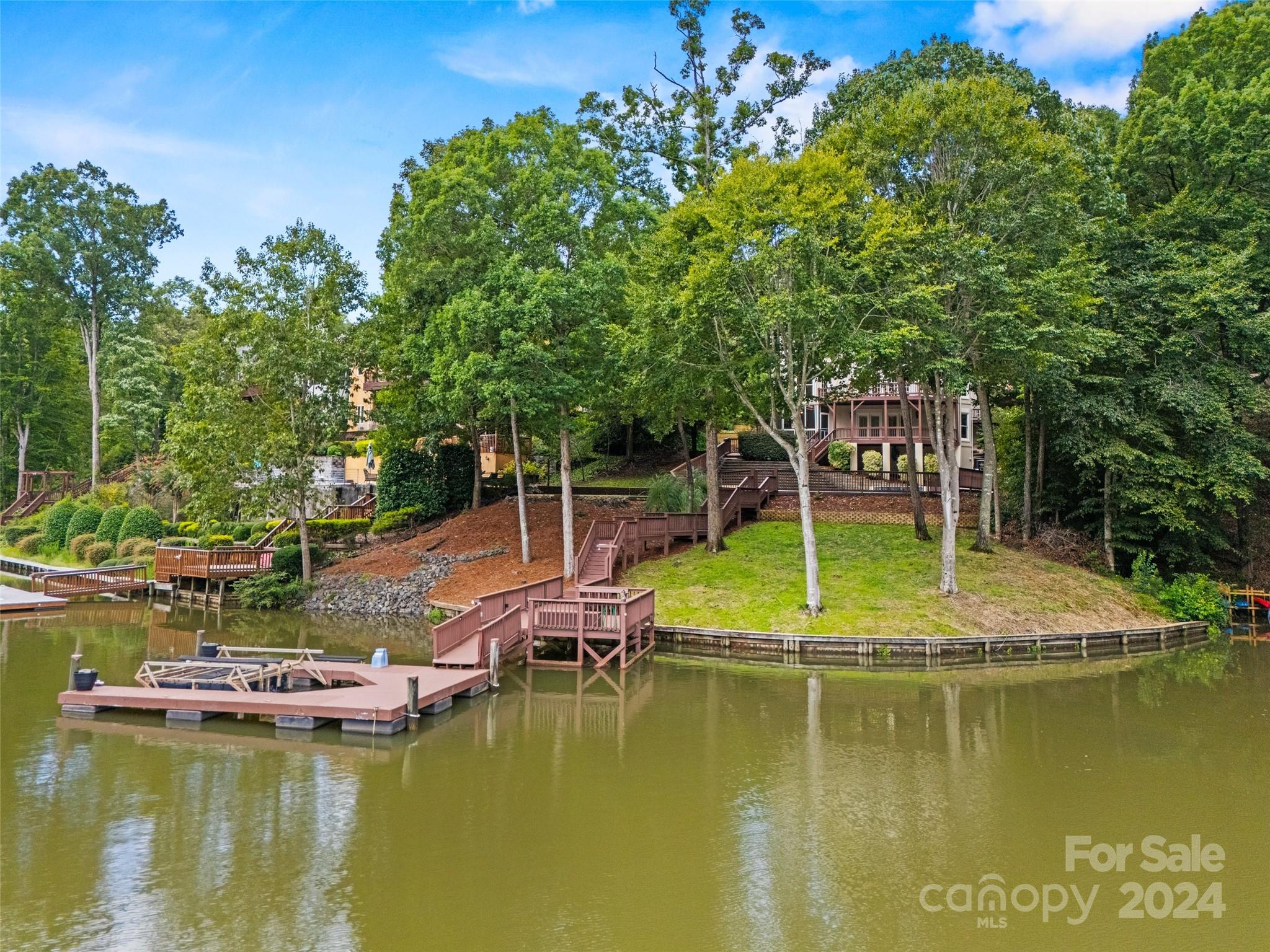 16201 Crest Cove Road Charlotte, NC 28278 - Photo 38 of 48 a view of an house with swimming pool and sitting area