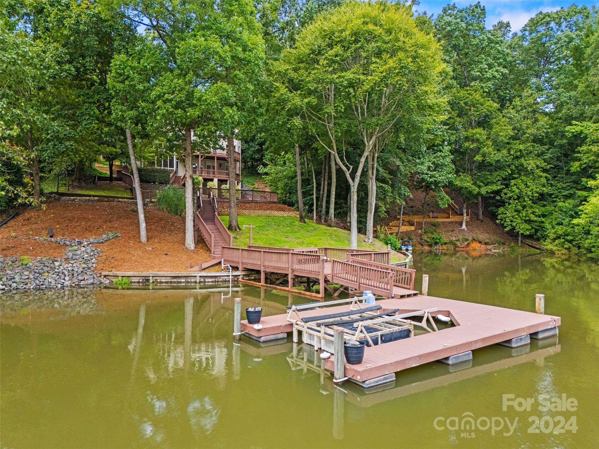 16201 Crest Cove Road Charlotte, NC 28278 - Photo 39 of 48 a view of a swimming pool with lounge chair