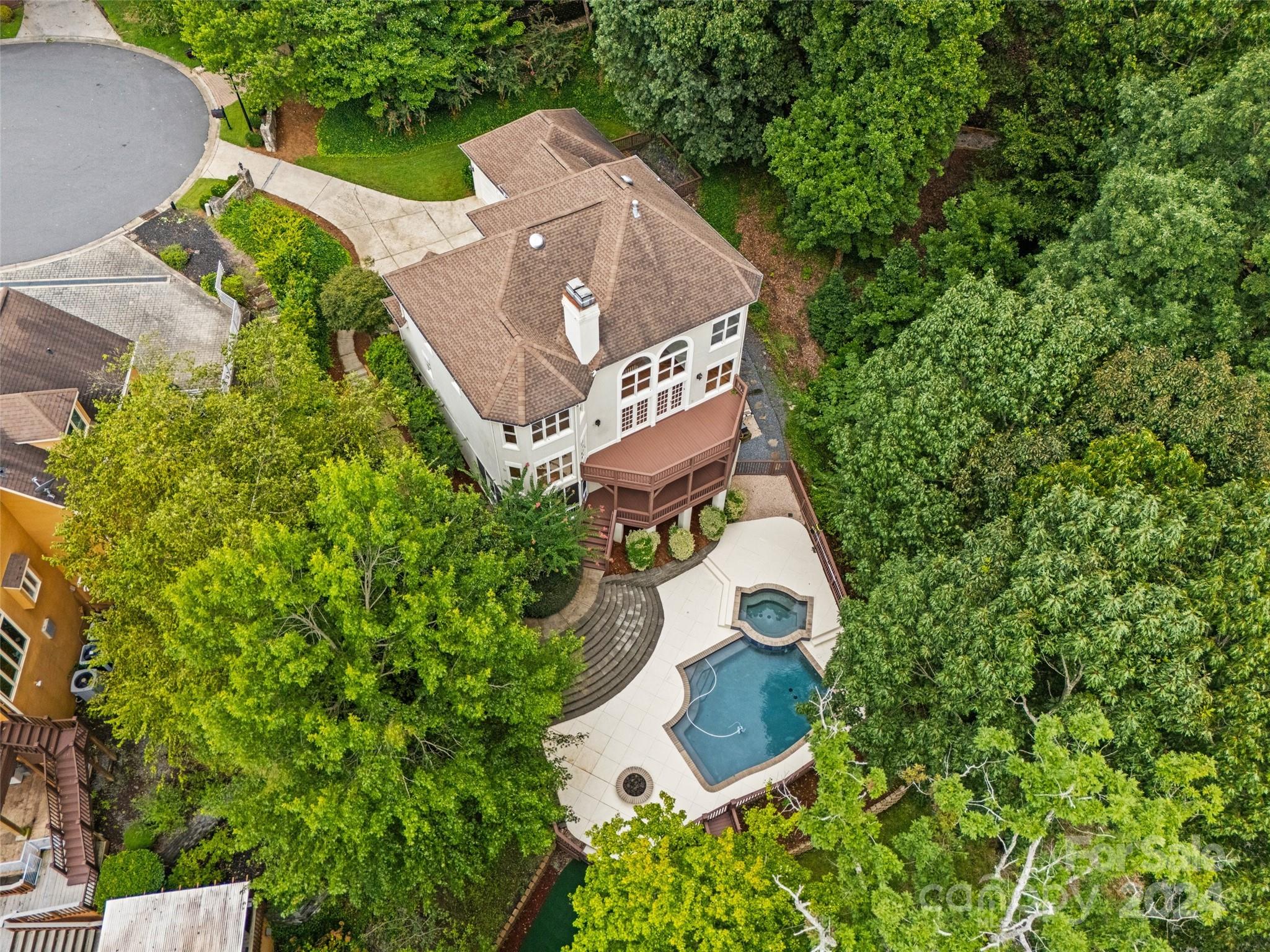 16201 Crest Cove Road Charlotte, NC 28278 - Photo 41 of 48 an aerial view of a house with a yard and trees