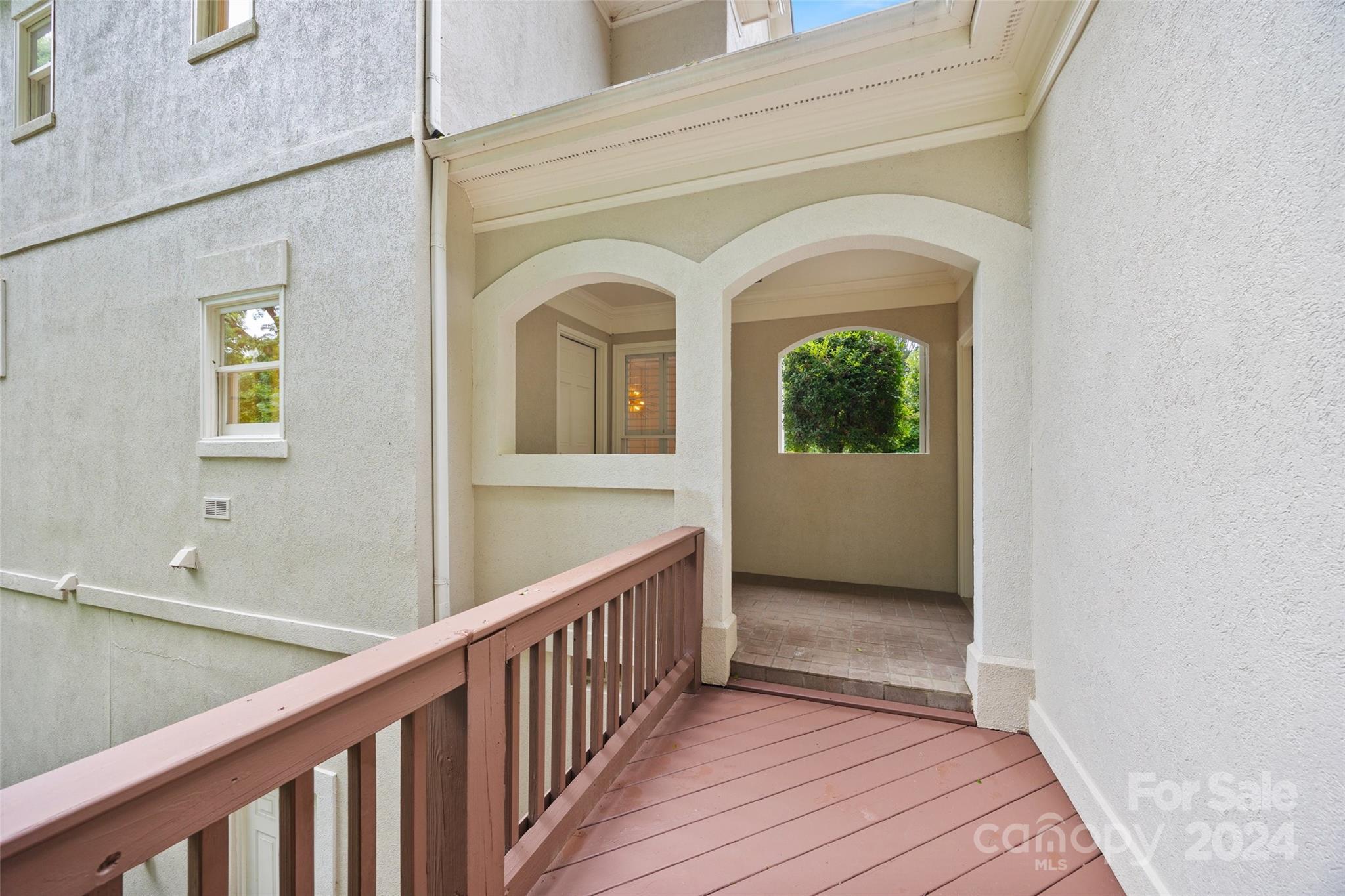 16201 Crest Cove Road Charlotte, NC 28278 - Photo 45 of 48 a view of a hallway with wooden floor and a window