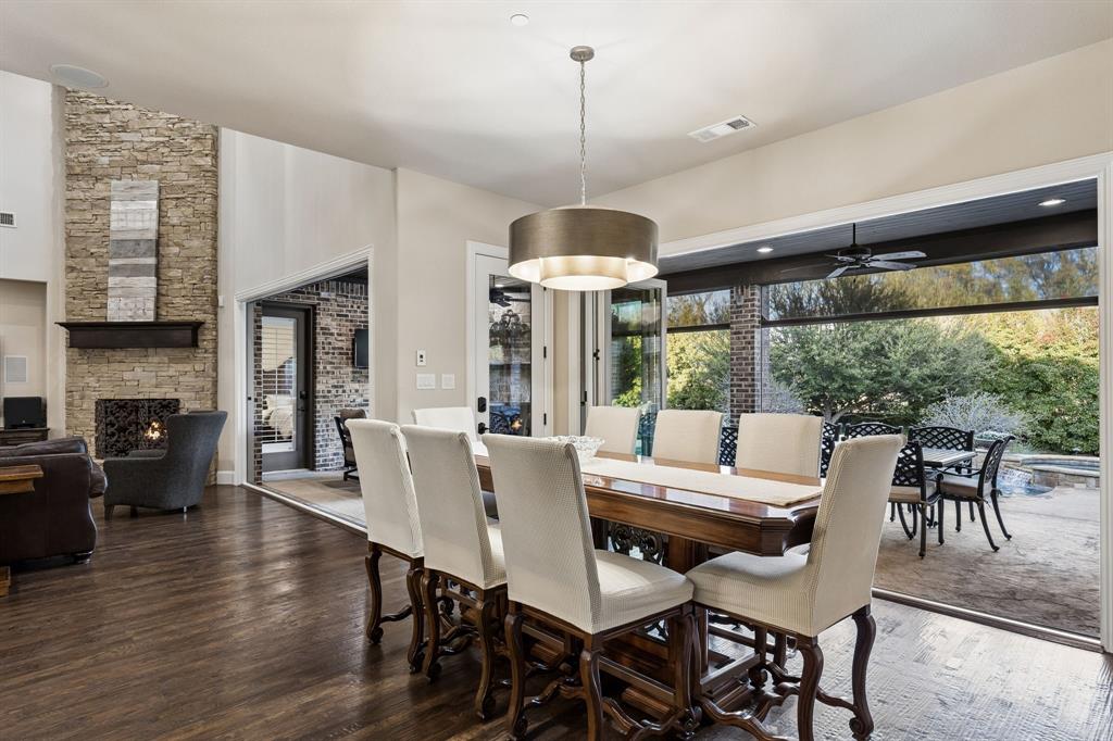 1005 Berkshire Road Southlake, TX 76092 - Photo 14 of 40 a view of a dining room with furniture window and wooden floor