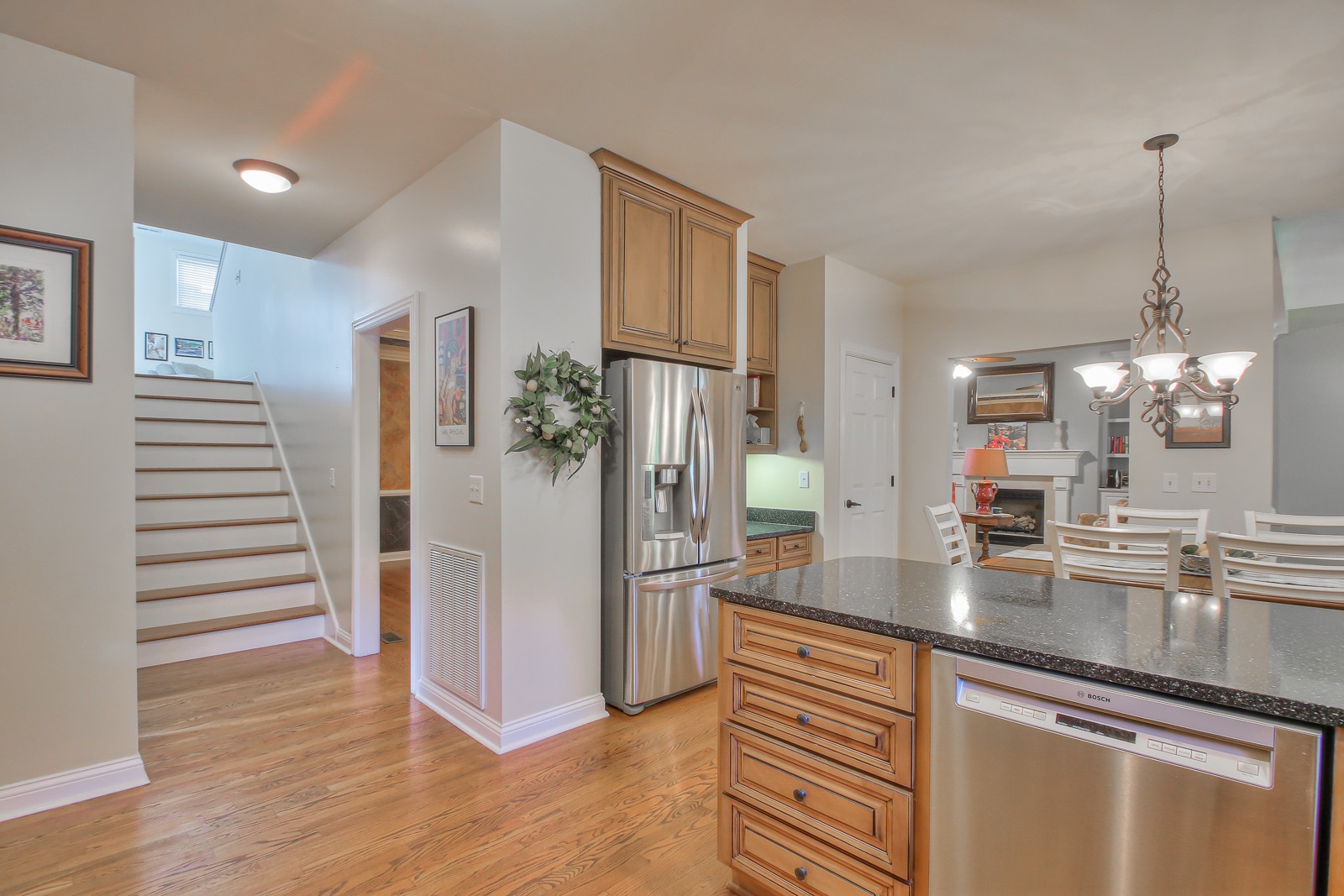 244 Chester Stevens Road Franklin, TN 37067 - Photo 13 of 56 a kitchen with stainless steel appliances granite countertop a refrigerator and a sink