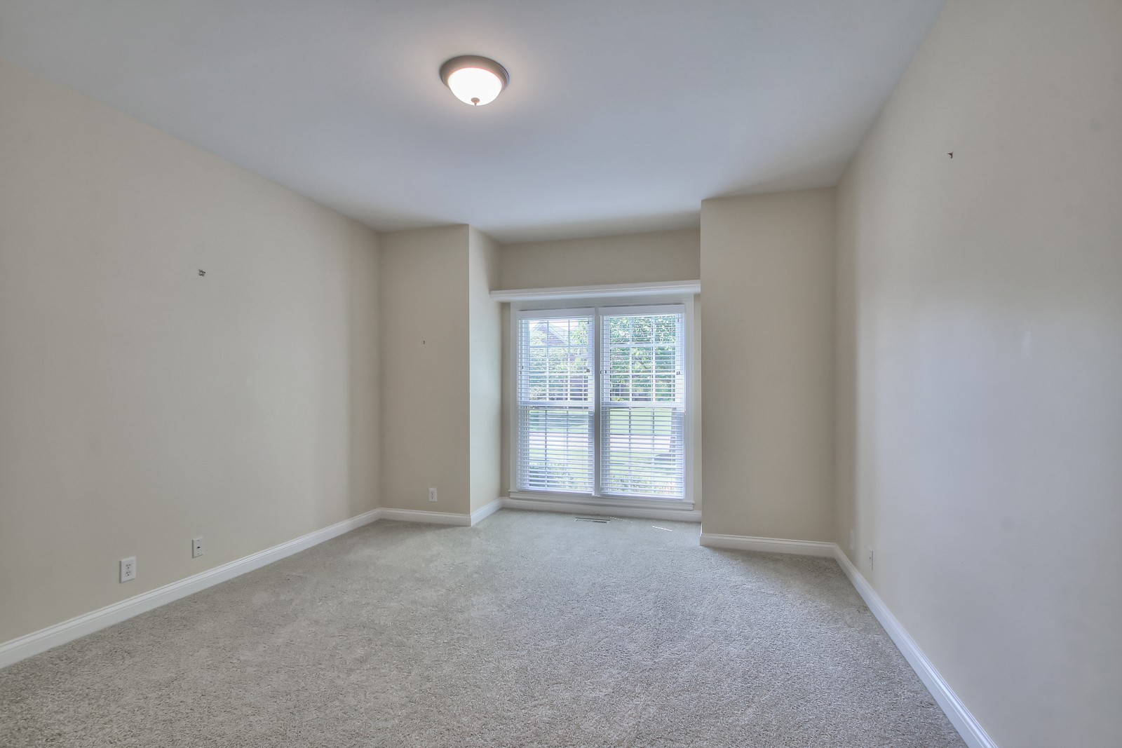 244 Chester Stevens Road Franklin, TN 37067 - Photo 28 of 56 an empty room with windows