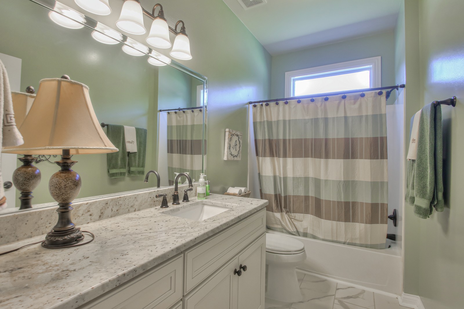 244 Chester Stevens Road Franklin, TN 37067 - Photo 30 of 56 a bathroom with a double vanity sink a toilet and shower