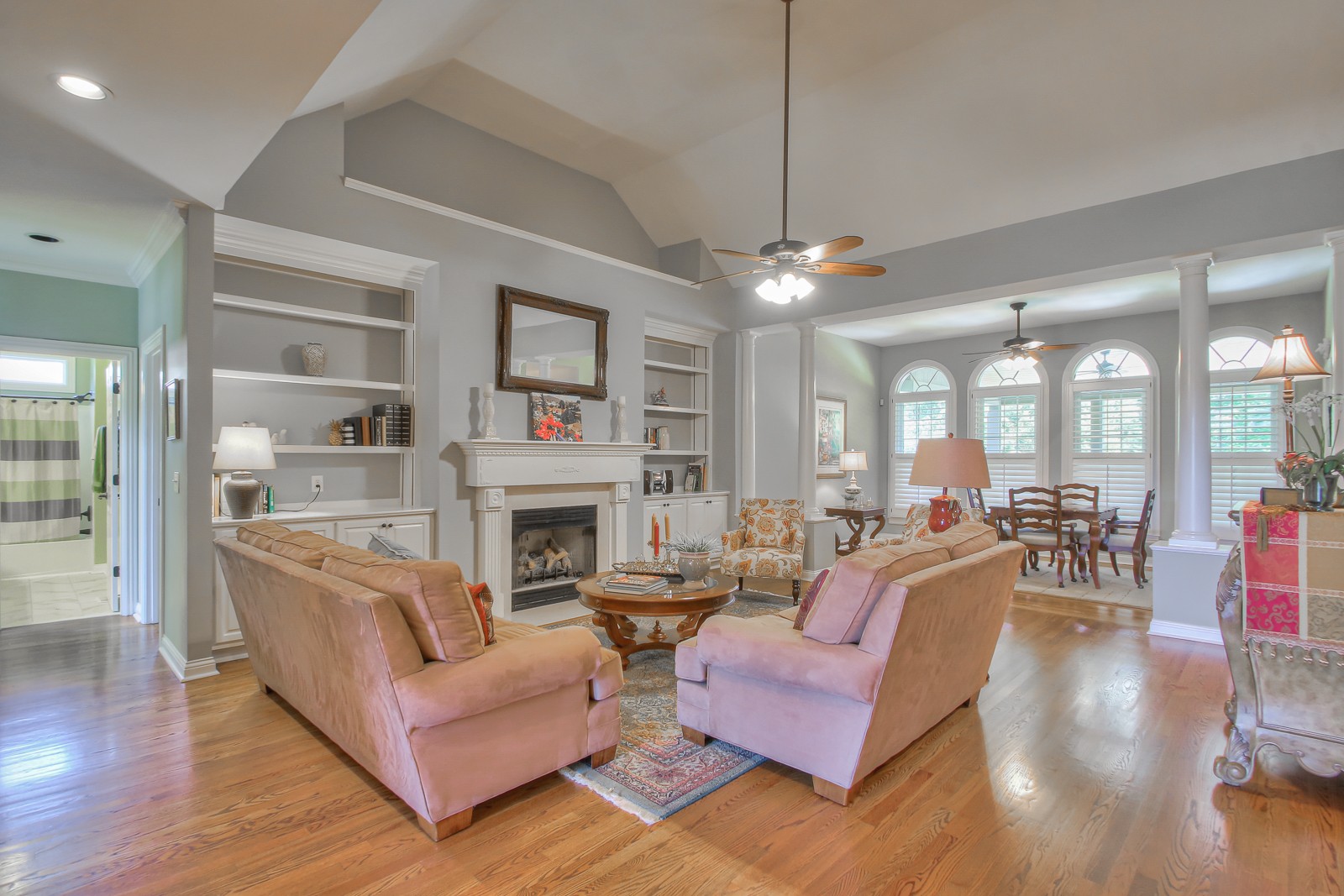 244 Chester Stevens Road Franklin, TN 37067 - Photo 3 of 56 a living room with fireplace furniture and a chandelier