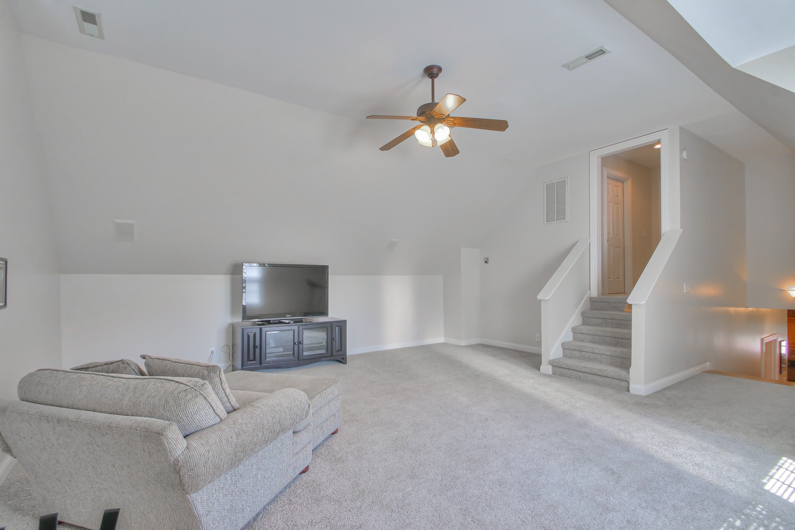 244 Chester Stevens Road Franklin, TN 37067 - Photo 37 of 56 a living room with furniture and a flat screen tv
