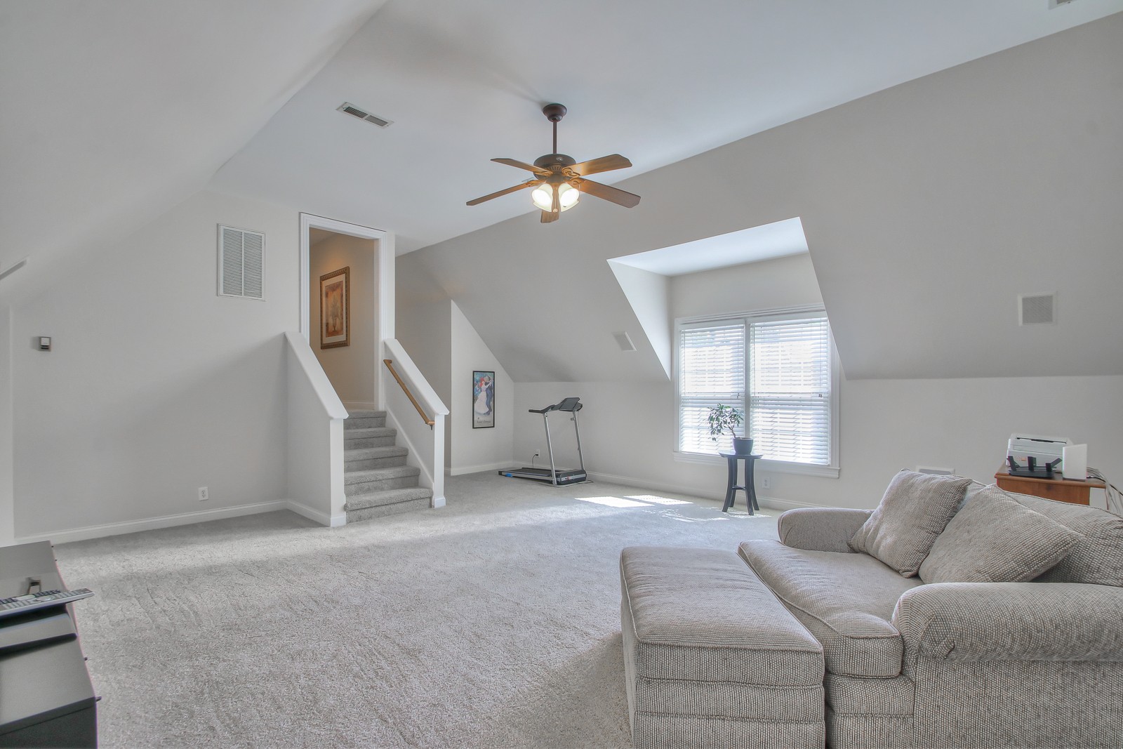 244 Chester Stevens Road Franklin, TN 37067 - Photo 38 of 56 a living room with furniture and a ceiling fan