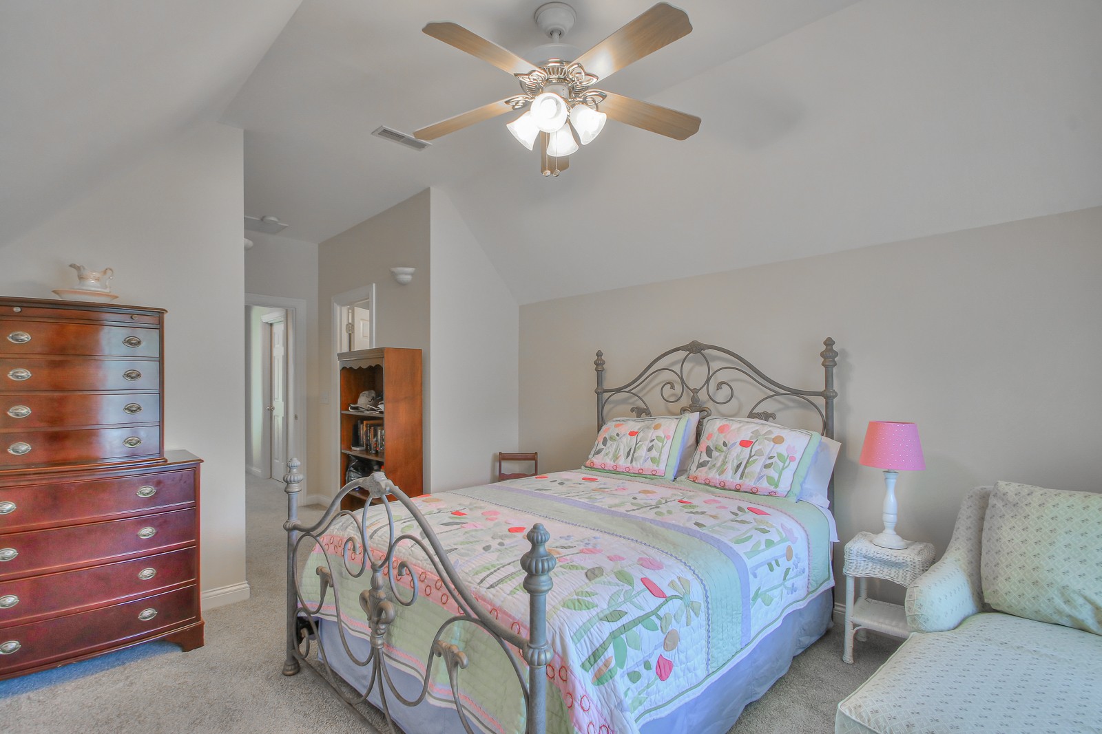 244 Chester Stevens Road Franklin, TN 37067 - Photo 41 of 56 a bedroom with a bed and a chandelier