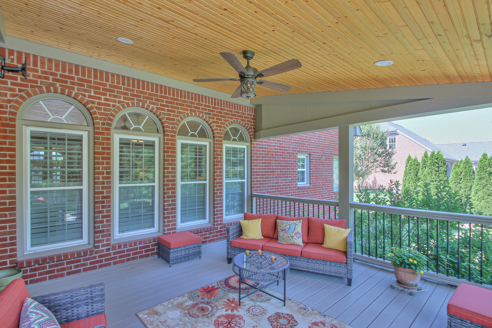 244 Chester Stevens Road Franklin, TN 37067 - Photo 45 of 56 a balcony with furniture and wooden floor