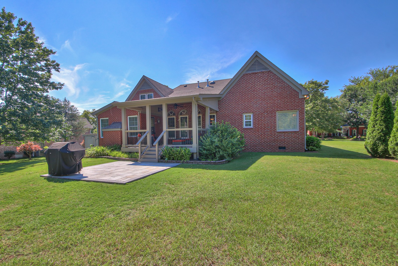 244 Chester Stevens Road Franklin, TN 37067 - Photo 47 of 56 a front view of a house with a garden and yard