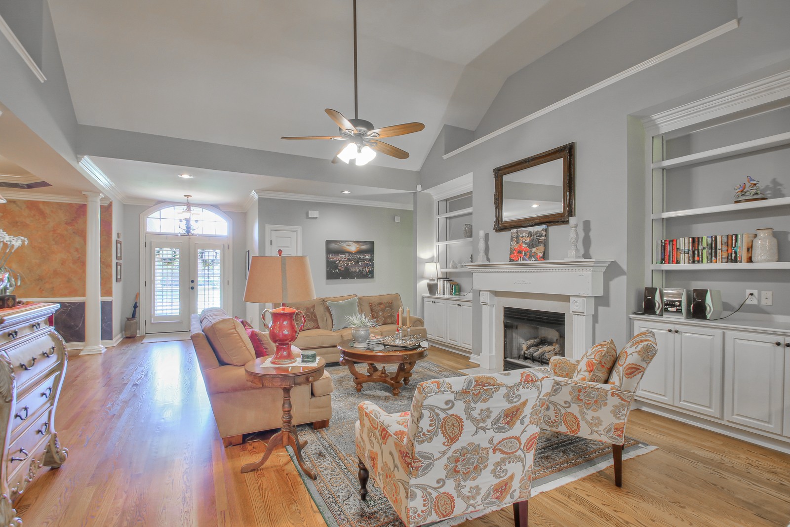 244 Chester Stevens Road Franklin, TN 37067 - Photo 6 of 56 a living room with furniture fireplace and wooden floor