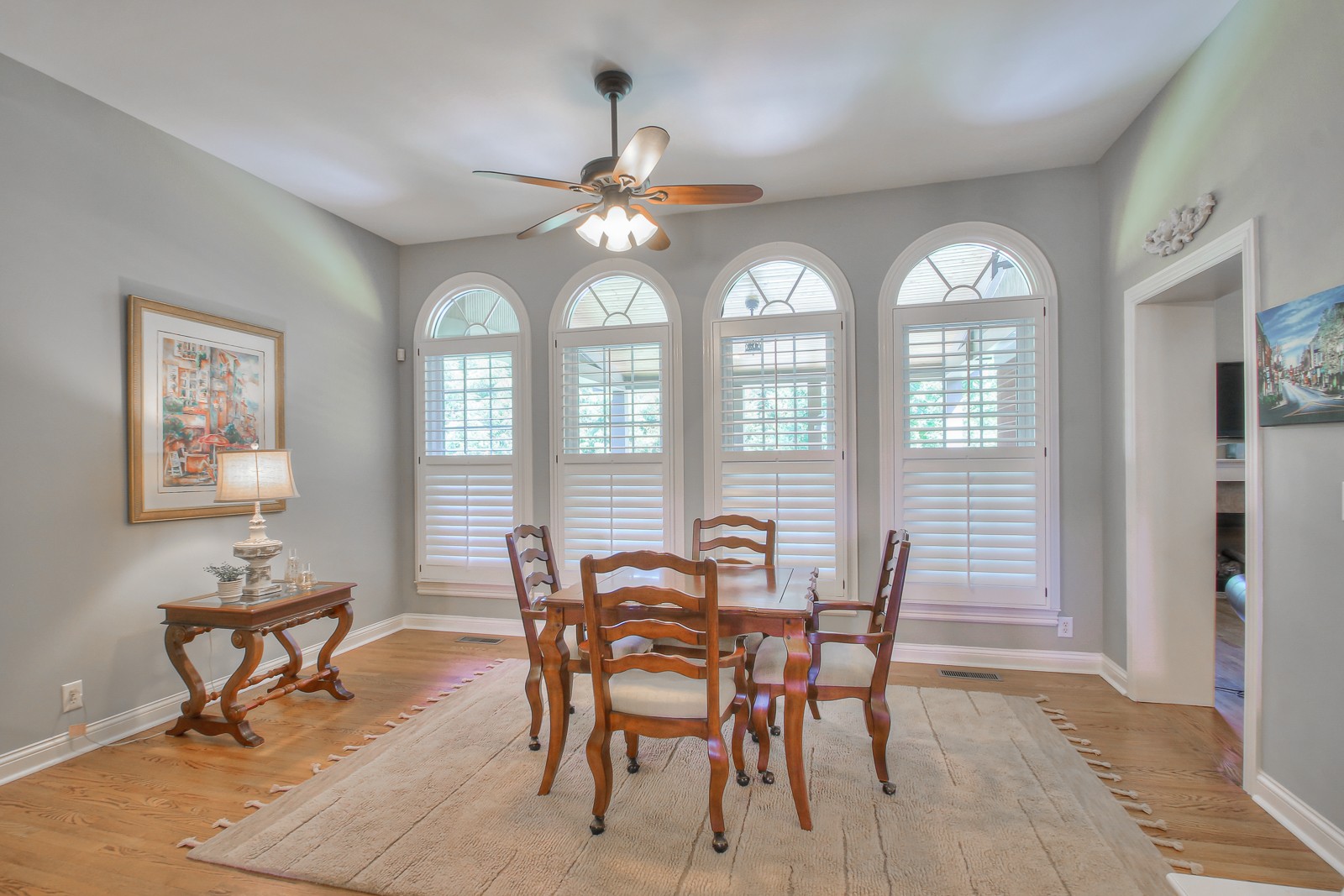 244 Chester Stevens Road Franklin, TN 37067 - Photo 8 of 56 a view of a dining room with furniture and a chandelier