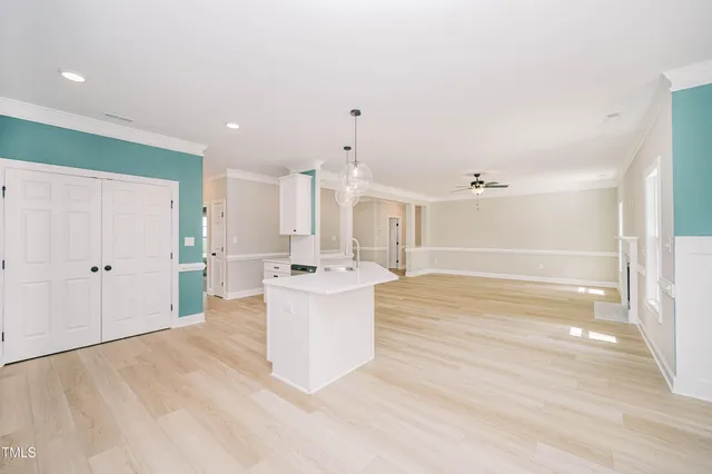 a view of kitchen with wooden floor