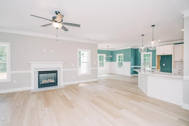 a view of a kitchen with a sink cabinets and a window