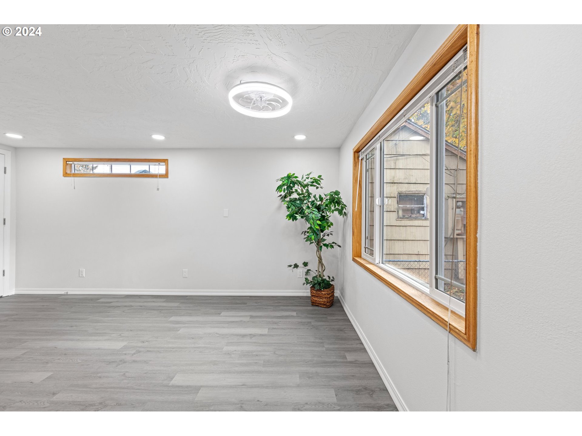1356 D Street Springfield, OR 97477 - Photo 23 of 45 a view of an entryway with wooden floor
