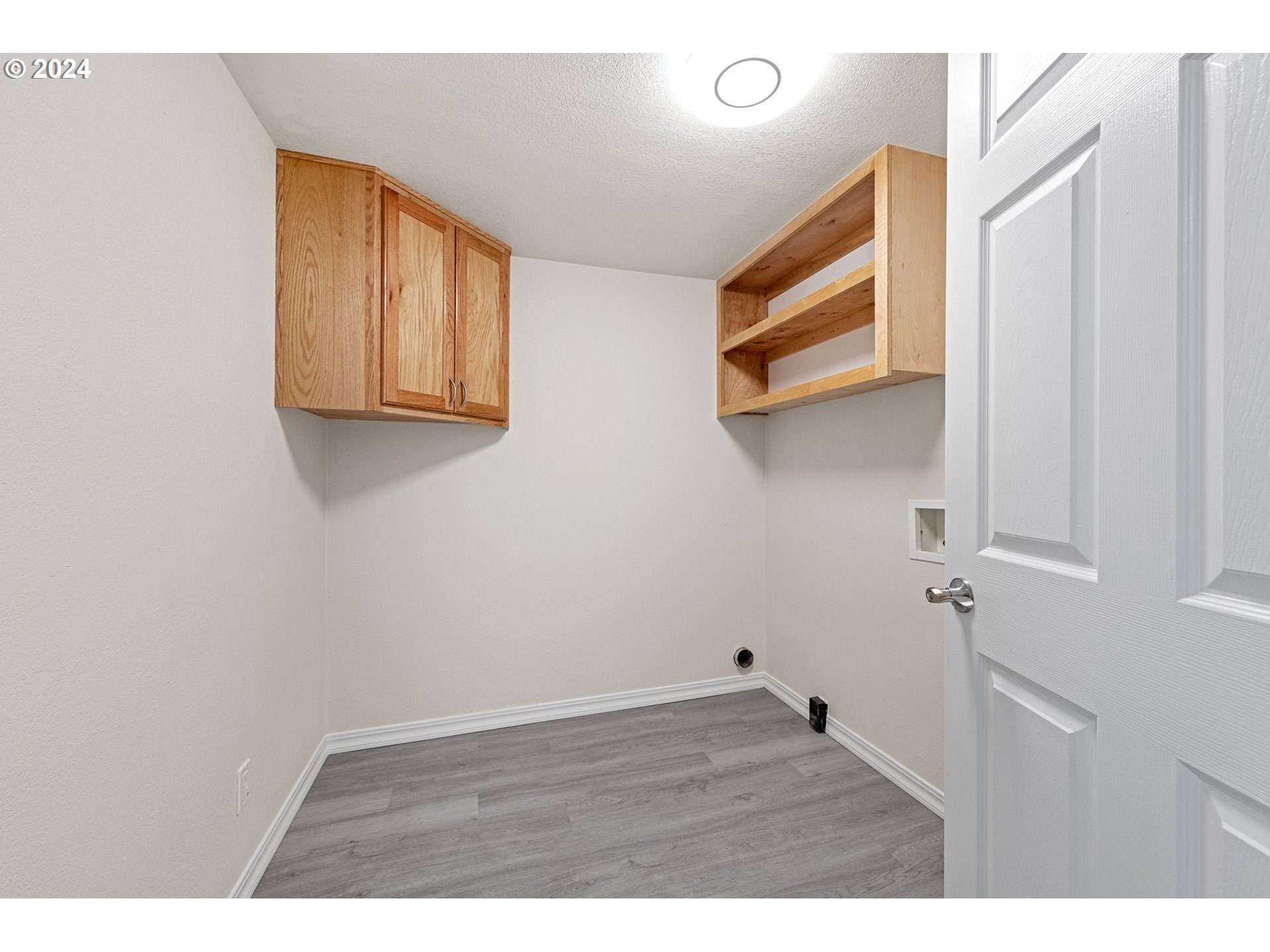 1356 D Street Springfield, OR 97477 - Photo 28 of 45 a view of an empty room with wooden floor