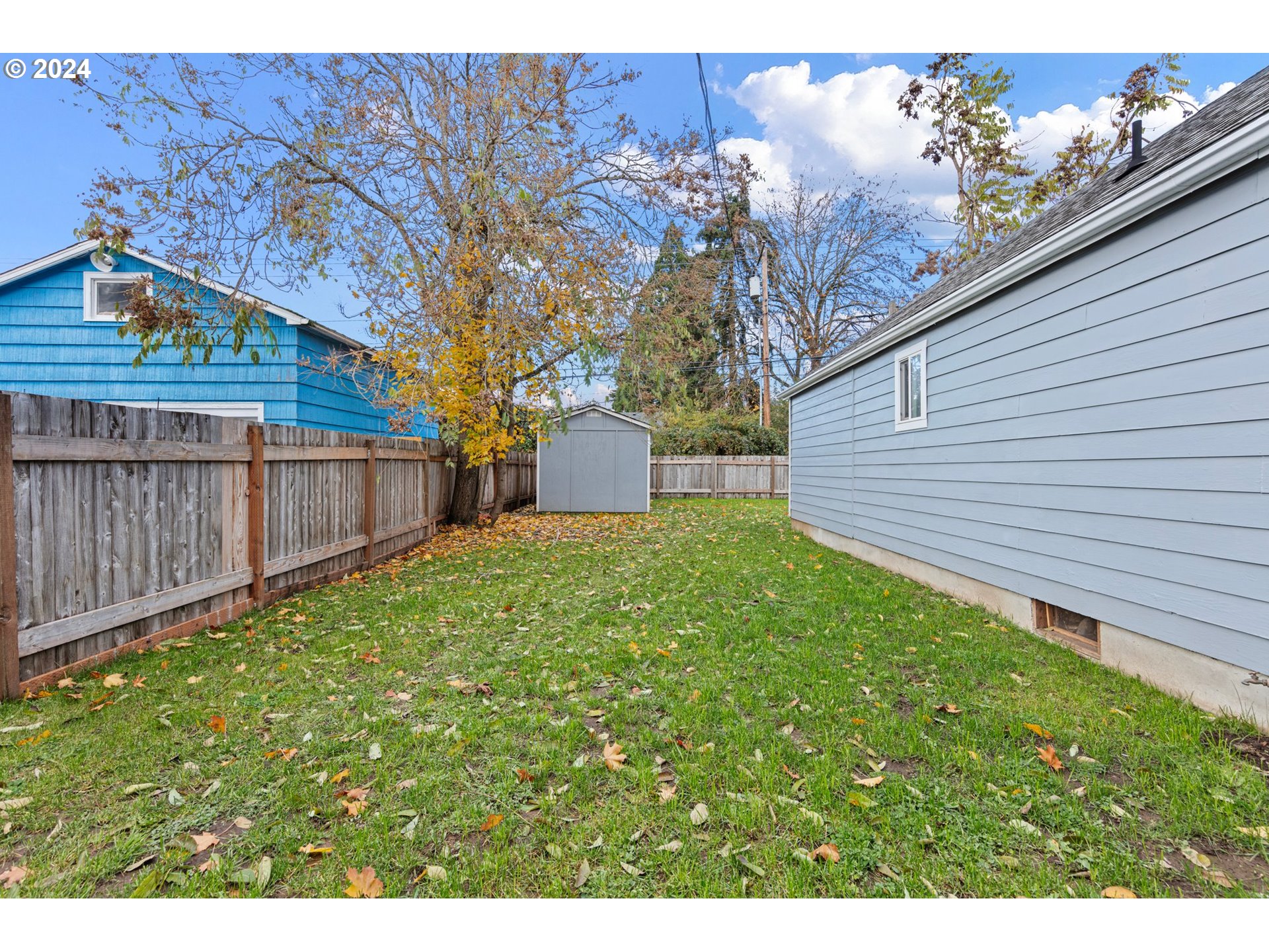 1356 D Street Springfield, OR 97477 - Photo 43 of 45 a backyard of a house with lots of green space