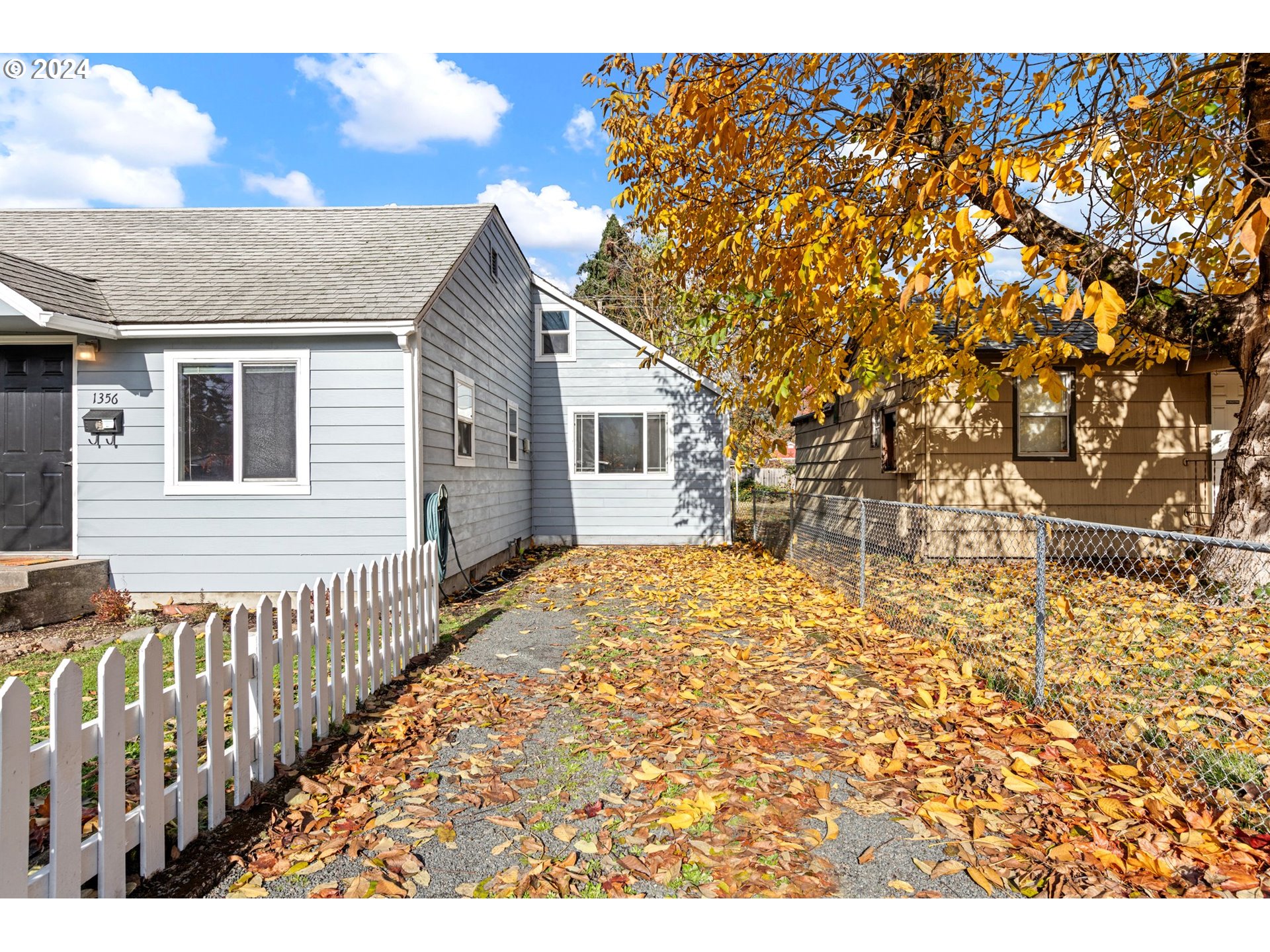 1356 D Street Springfield, OR 97477 - Photo 45 of 45 a view of a backyard with wooden fence