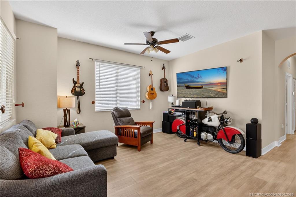 61 Southeast Palermo, Unit 204 Stuart, FL 34994 - Photo 31 of 32 Updated flooring, vaulted ceilings, open floor plan.