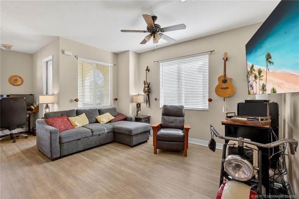 61 Southeast Palermo, Unit 204 Stuart, FL 34994 - Photo 32 of 32 Open floor plan, room for office space and a retreat to the balcony.