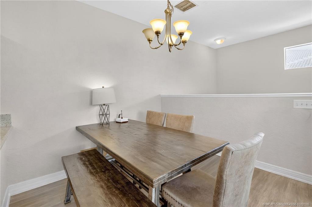61 Southeast Palermo, Unit 204 Stuart, FL 34994 - Photo 9 of 32 Spacious dining accommodates 5+
