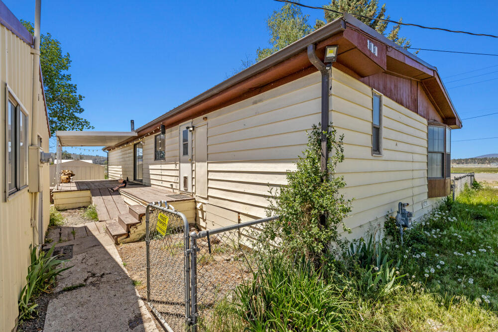 31410 Union Street Bonanza, OR 97623 - Photo 24 of 37 a view of a house with backyard and sitting area