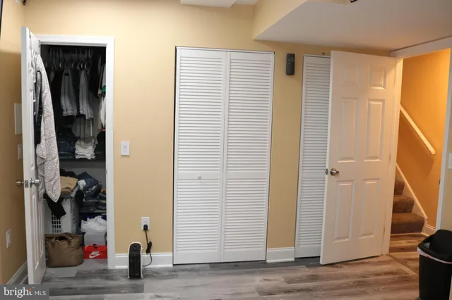 a view of a bedroom with closet area