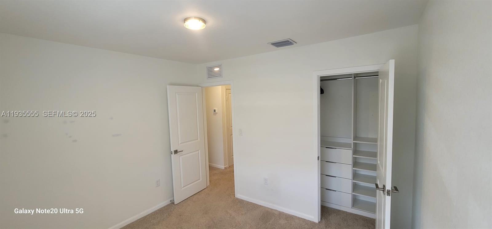 2459 Southeast 10th Street Homestead, FL 33035 - Photo 15 of 15 a view of closet area