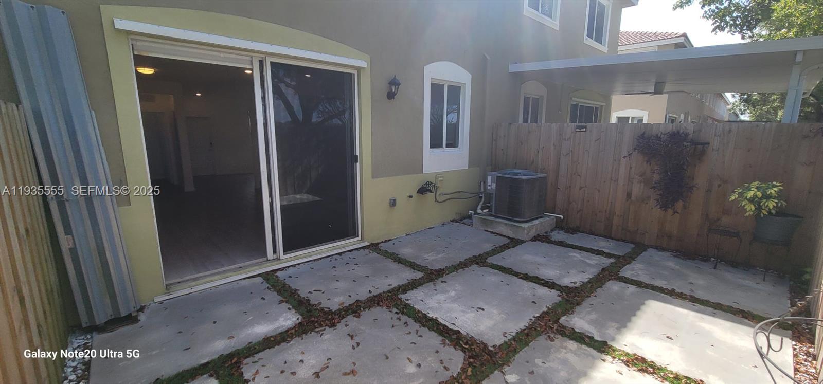 2459 Southeast 10th Street Homestead, FL 33035 - Photo 7 of 15 a bed room with a bed and a window