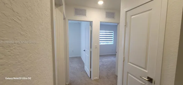 a view of a bathroom with a sink