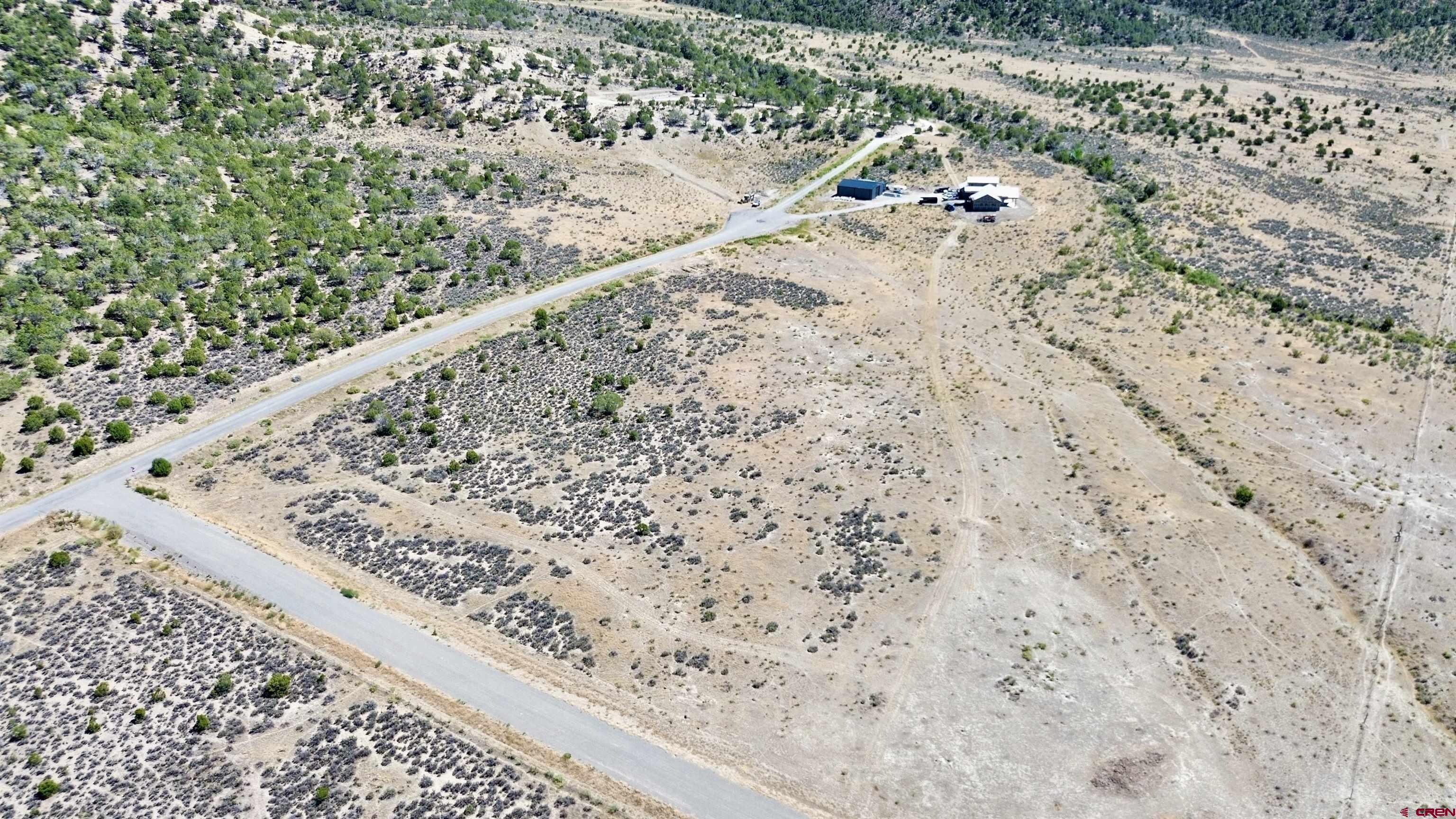 Tbd Lot 26 Tbd Road Montrose, CO 81401 - Photo 12 of 15 a view of mountain view with wooden fence