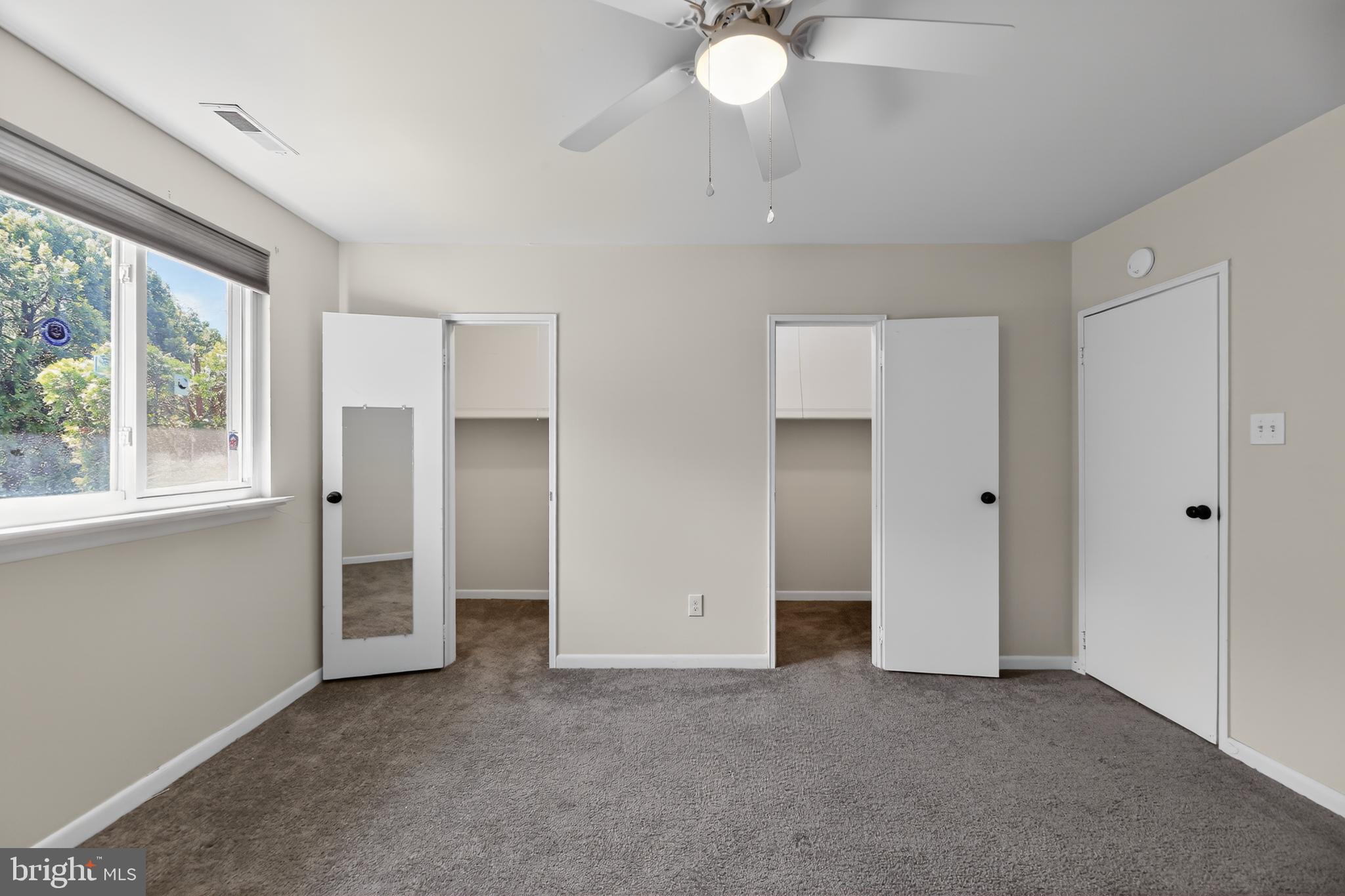 411 Stiles Avenue, Unit B11 Maple Shade, NJ 08052 - Photo 17 of 25 a view of an empty room with a window