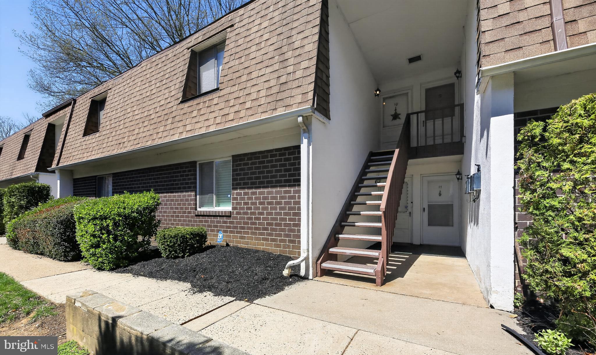 411 Stiles Avenue, Unit B11 Maple Shade, NJ 08052 - Photo 3 of 25 a view of a house with entryway and stairs