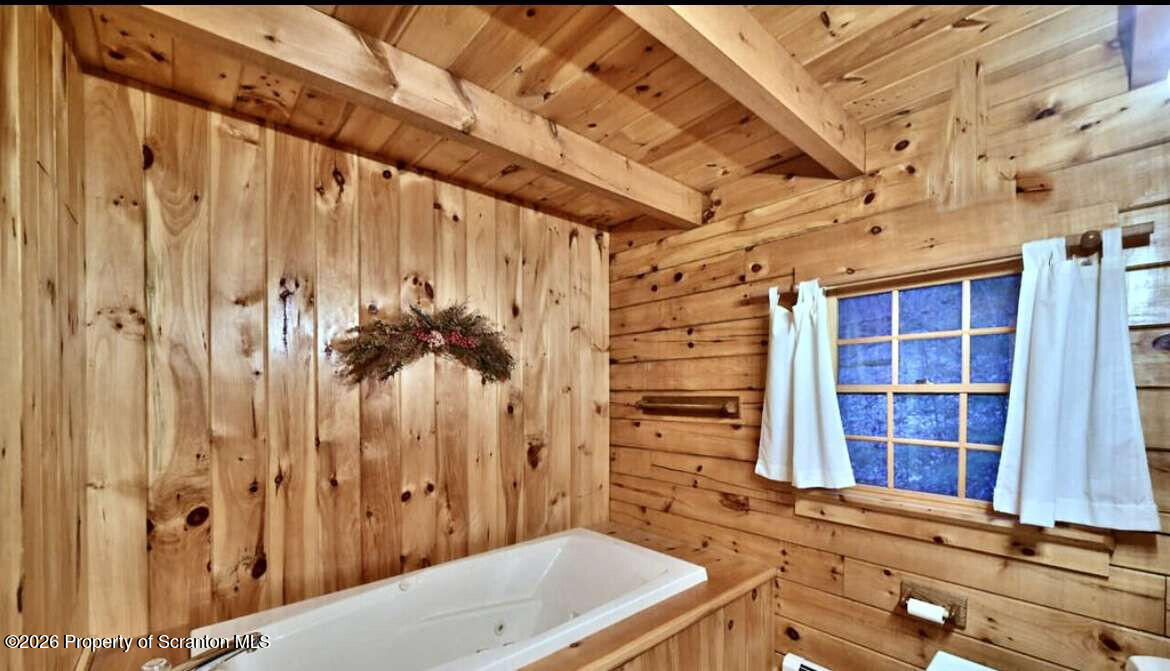 9 East Lake Road Moscow, PA 18444 - Photo 23 of 48 a bathroom with a tub and shower