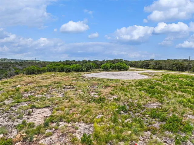 a view of a lake from a yard